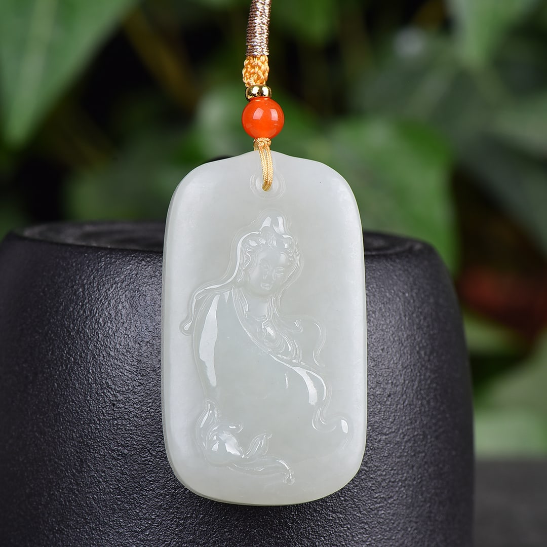 An Exquisite White Jade Statue of Avalokitesvara Pendant: An Exquisite White Jade Statue of Avalokitesvara Pendant,Size:23mmx50mm 白玉观音像挂件