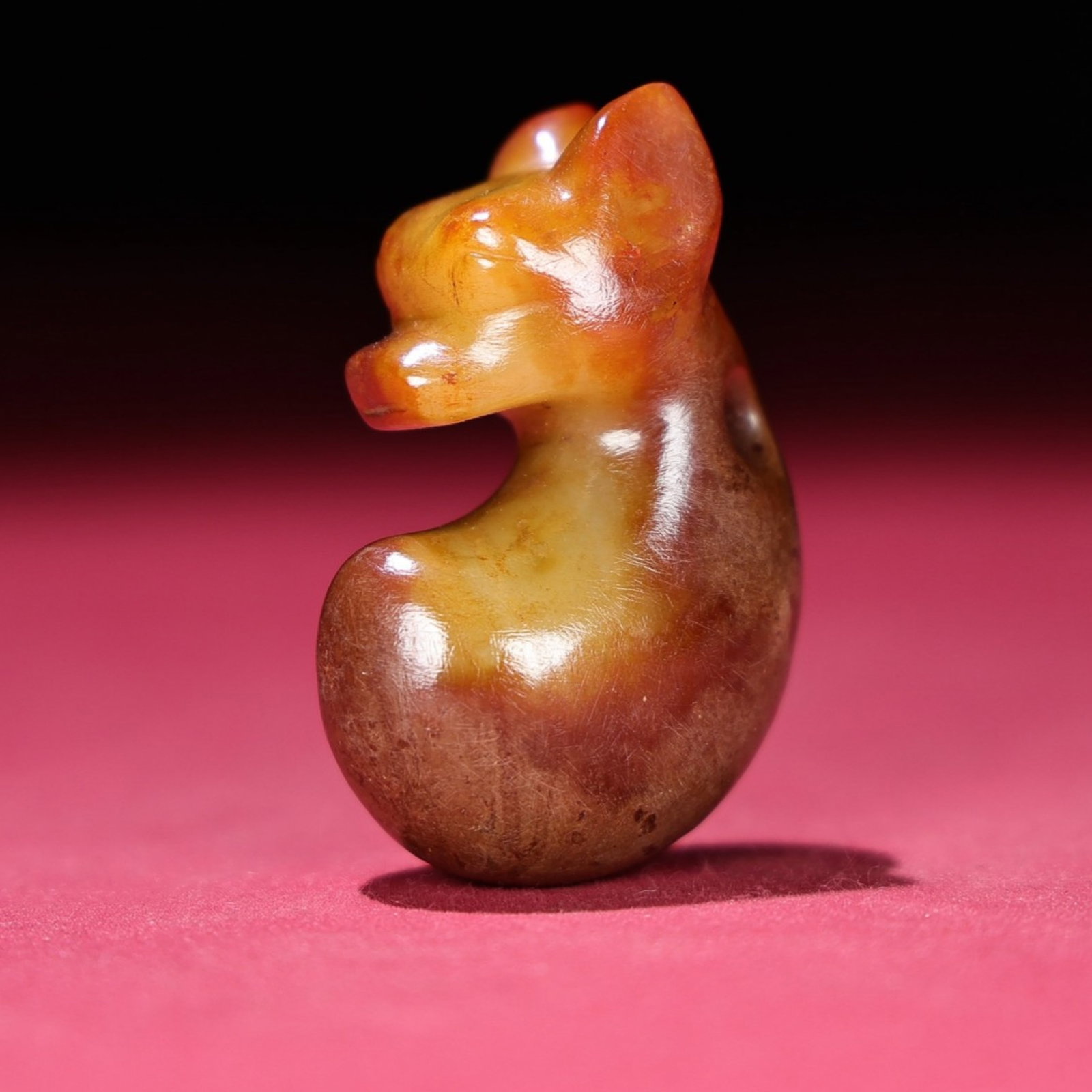 An Exquisite Archaic Jade Auspicious Beast Pendant (1 of 8)