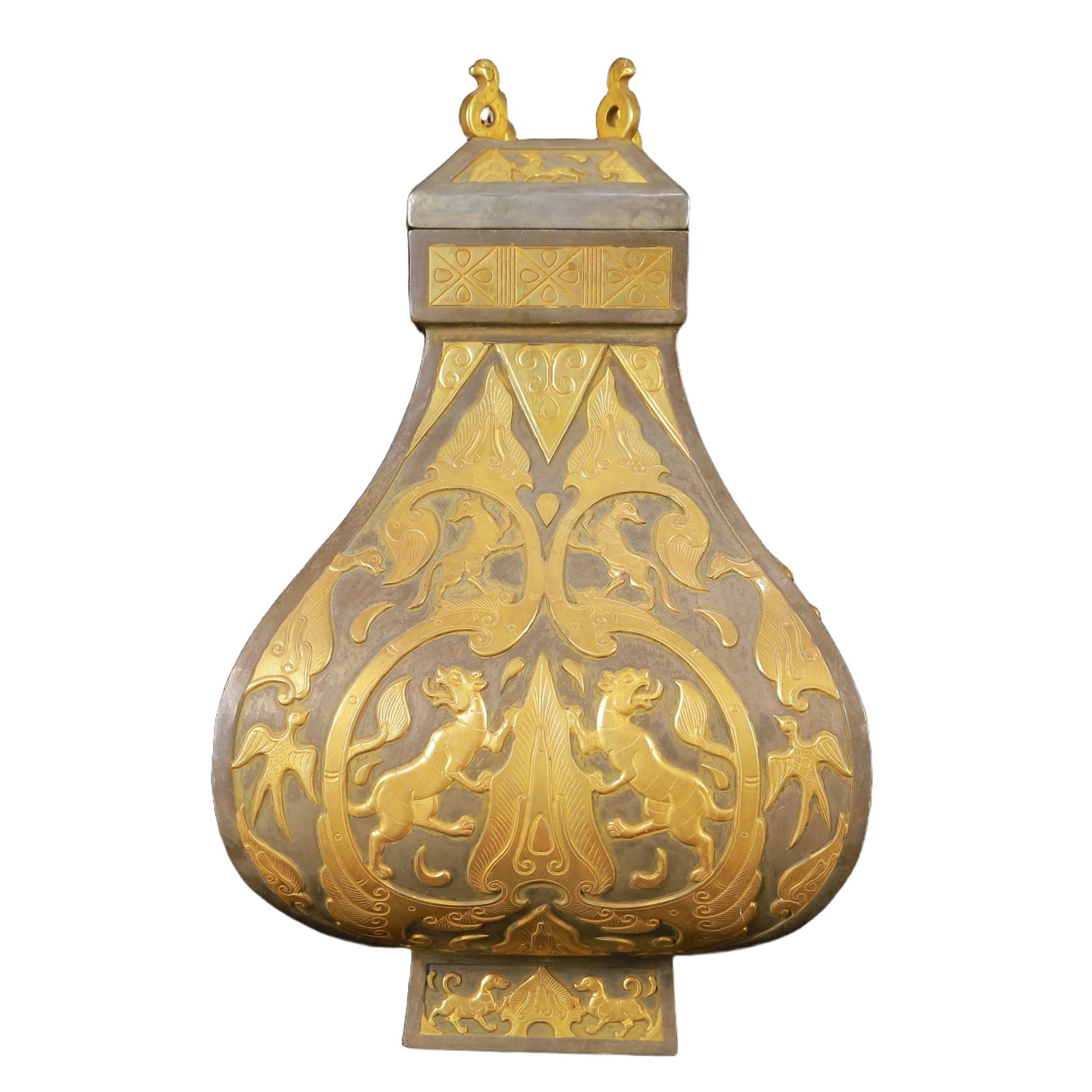 An Exquisite Gilt Silver Auspicious Beast Pattern Beast-Ears Cover Jar: An Exquisite Gilt Silver Auspicious Beast Pattern Beast-Ears Cover Jar,Tang Dynasty,China,Zhenguan Four-Character Mark,Size:7.1inx11.4in,Weight:3150g 银鎏金瑞兽纹&#