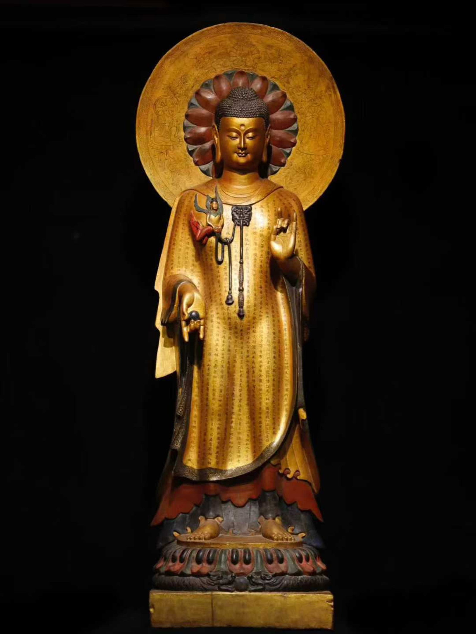 A Solemn Limestone Gilt Painted Color Statue of Sakyamuni,With Scriptures: A Solemn Limestone Gilt Painted Color Statue of Sakyamuni,With Scriptures,N.Qi,China,Size:70.9inx23.6inx13in 青石鎏金彩绘释迦摩尼像,&#