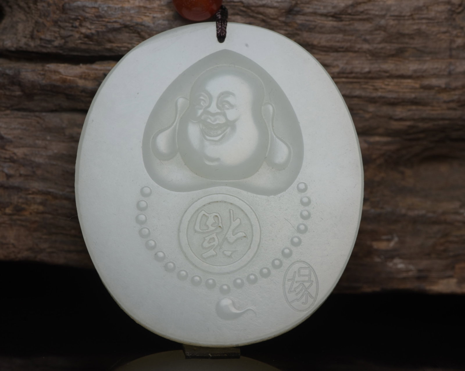 An Exquisite White Jade Statue of Maitreya Buddha Pendant: An Exquisite White Jade Statue of Maitreya Buddha Pendant,Qing Dynasty,China,Size:2inx1.8inx0.3in,Weight:46g 白玉弥勒佛像挂件,中国清&#