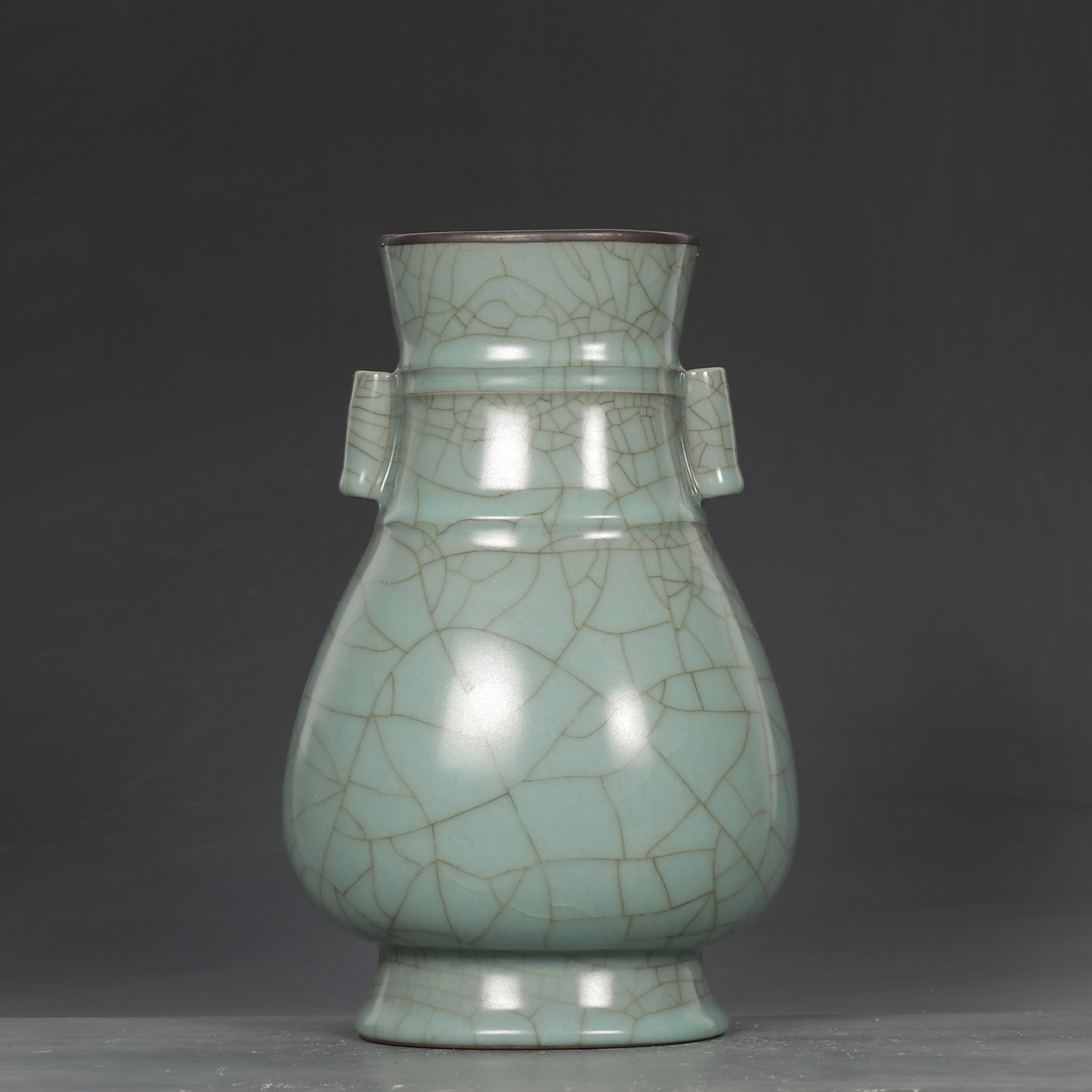 An Exquisite Guan yao Celadon Glazed Cover with Silver Double-Ears Vase,with an Imperial Poem by: An Exquisite Guan yao Celadon Glazed Cover with Silver Double-Ears Vase,with an Imperial Poem by Emperor Qianlong,Song Dynasty,China,Size:9.8inx6.3in 官窑青釉银口&#