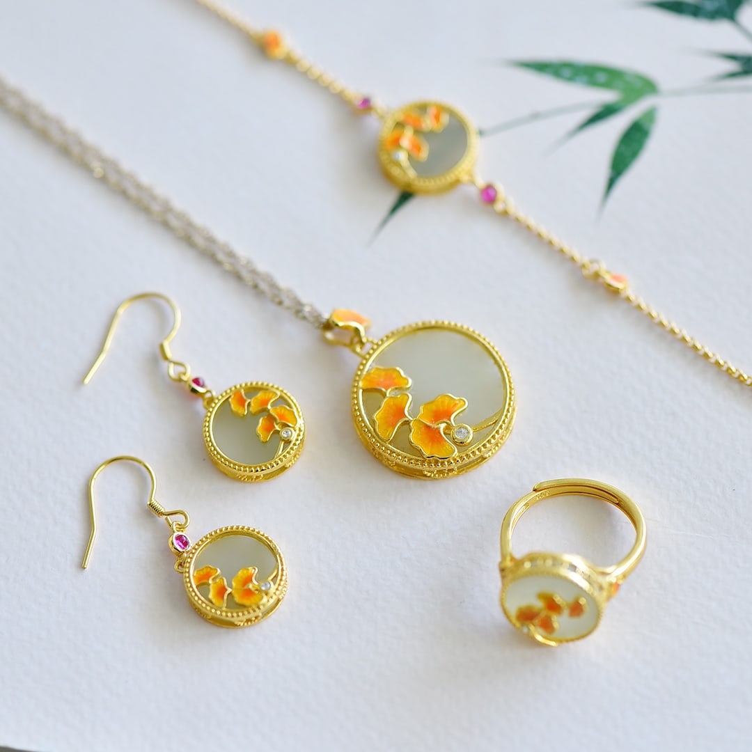 A Set of Fine Sterling Silver-Gold Plated Inlaid White Jade Jewelry: A Set of Fine Sterling Silver-Gold Plated Inlaid White Jade Jewelry 一套纯银镀金镶白玉首饰