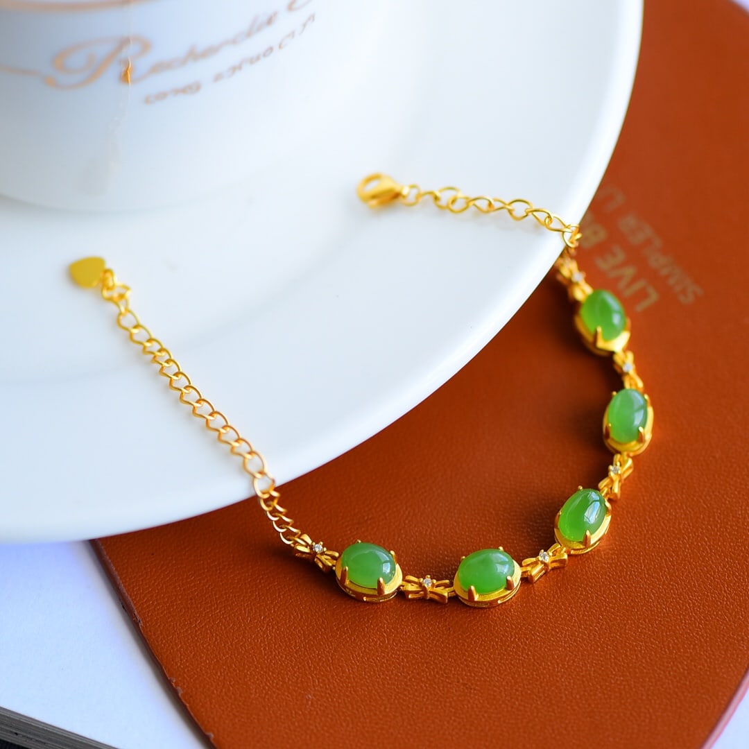 An Exquisite Sterling Silver-Gold Plated Inlaid Jasper Bracelet: An Exquisite Sterling Silver-Gold Plated Inlaid Jasper Bracelet,Size:5mmx7mm 纯银镀金镶碧玉手链