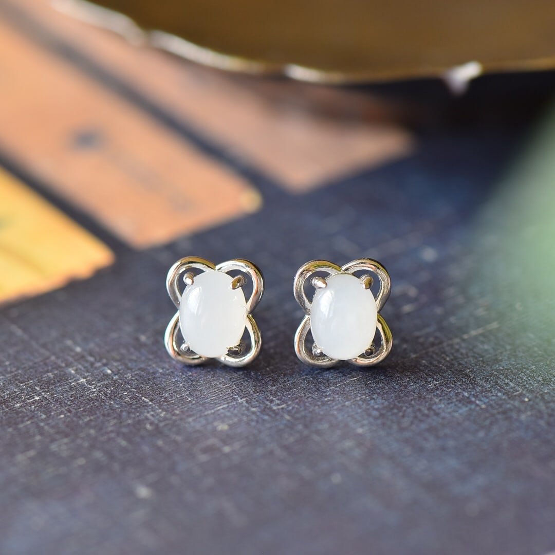 A Pair of Exquisite Sterling Silver Inlaid White Jade Earrings: A Pair of Exquisite Sterling Silver Inlaid White Jade Earrings,Size:9mmx10mm 一对纯银镶白玉耳钉