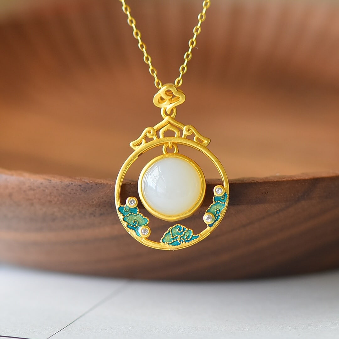 An Exquisite Sterling Silver-Gold Plated Inlaid White Jade Enamel Pendant: An Exquisite Sterling Silver-Gold Plated Inlaid White Jade Enamel Pendant,Size:10mmx10mm 纯银镀金镶白玉珐琅吊坠
