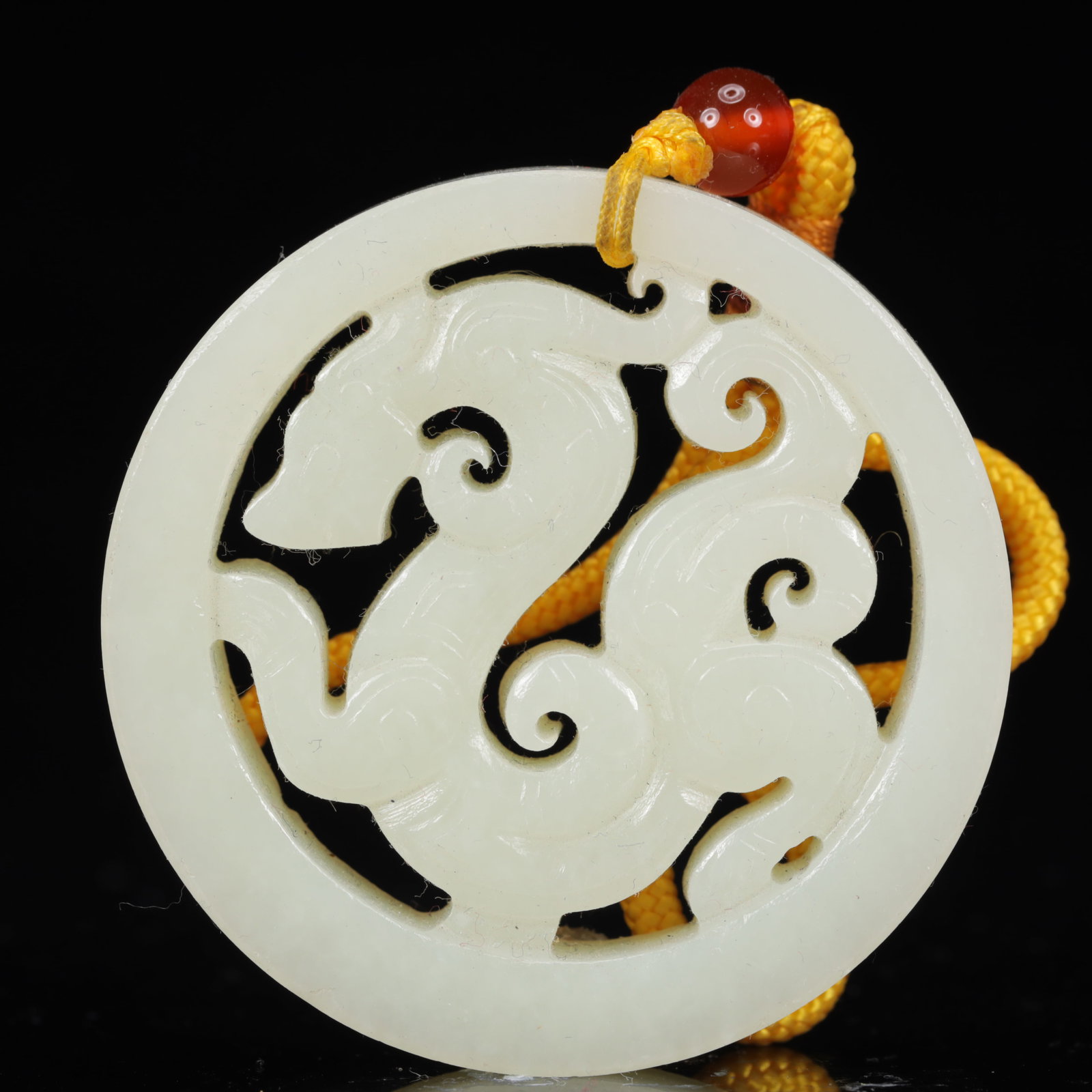 An Exquisite White Jade Chi-Dragon Pattern Pendant (1 of 4)