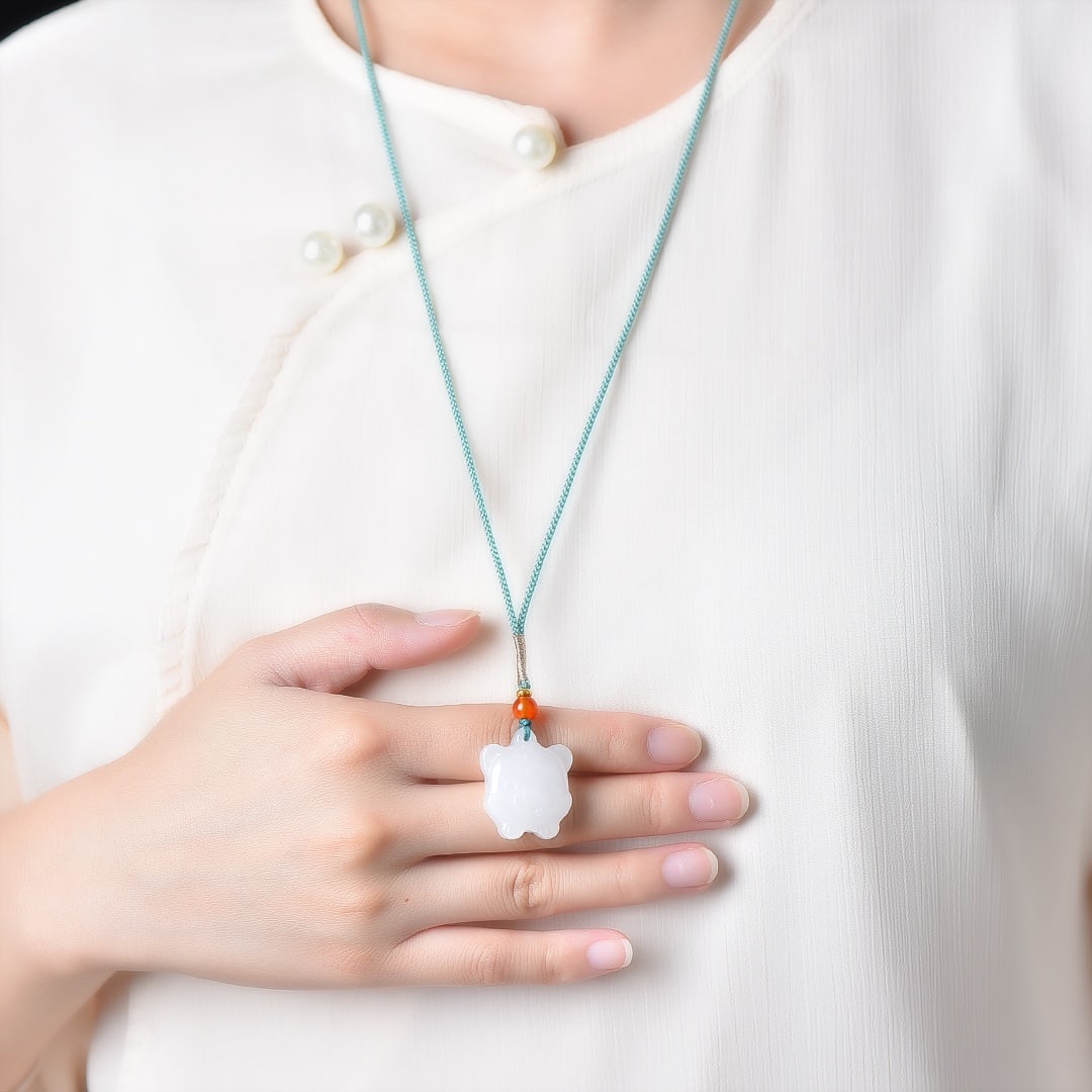 An Exquisite White Jade Tiger Pattern Pendant (1 of 5)
