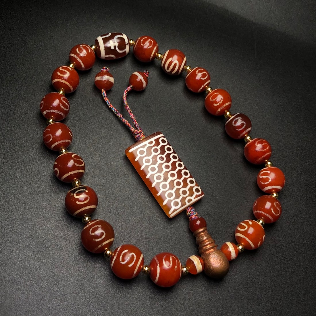 An Exquisite Agate Pendant: An Exquisite Agate Pendant,Size:14mm,(Dzi Bead)40mmx22mm 玛瑙挂件