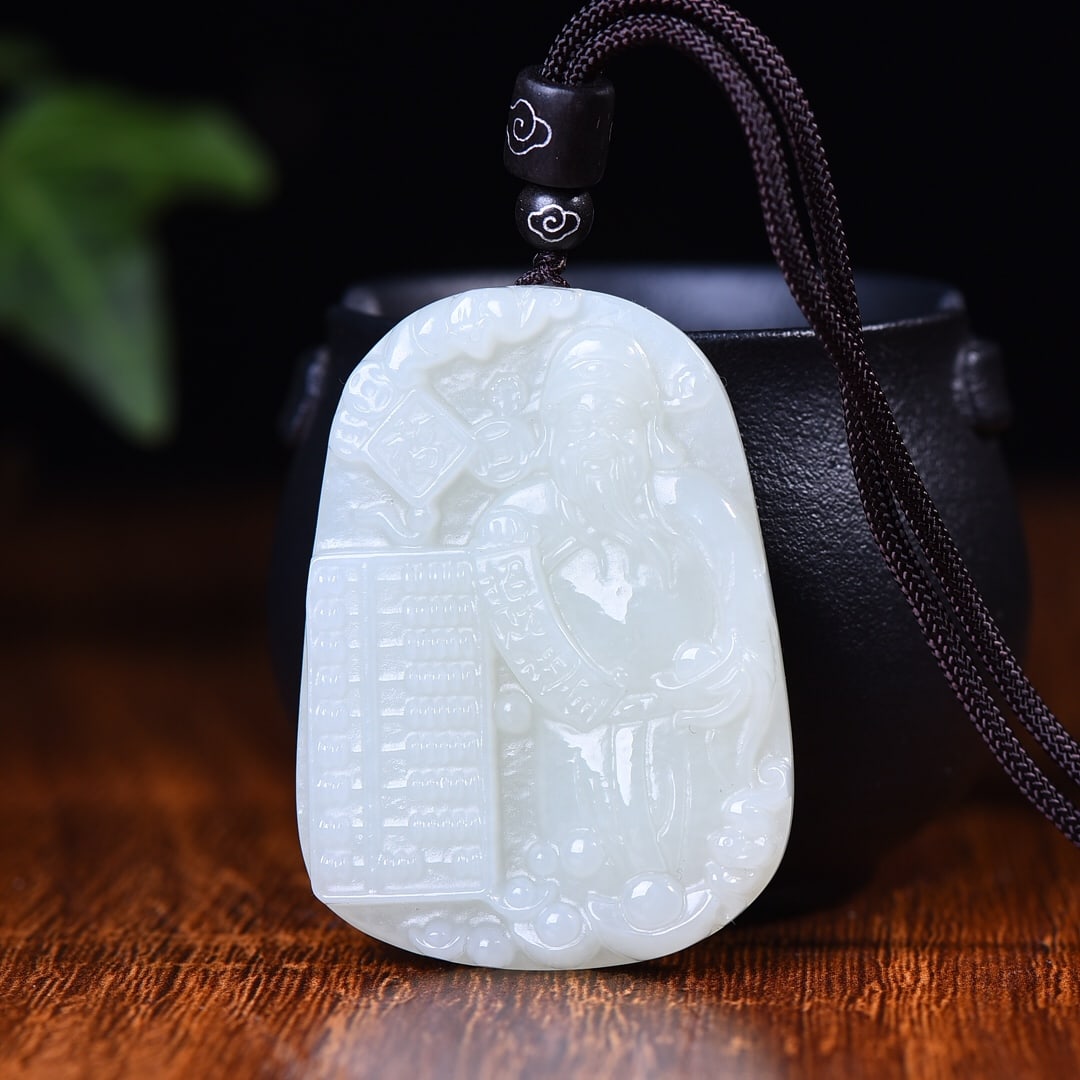 An Exquisite White Jade Statue of Mammon Pendant: An Exquisite White Jade Statue of Mammon Pendant,Size:55mmx40mm 白玉财神像挂件