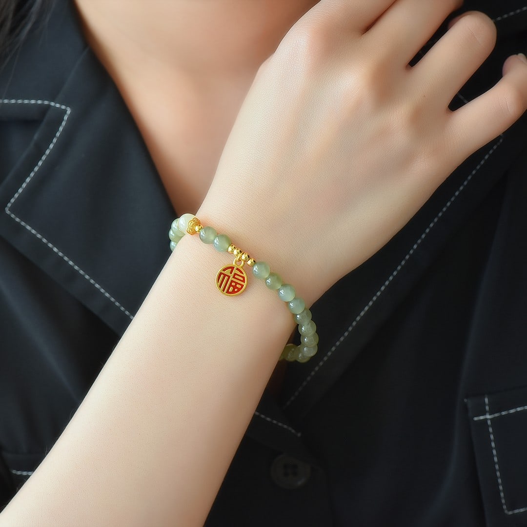 An Exquisite Sterling Silver-Gold Plated Inlaid Sapphire Bracelet: An Exquisite Sterling Silver-Gold Plated Inlaid Sapphire Bracelet,Size:6mm 纯银镀金镶青玉手链
