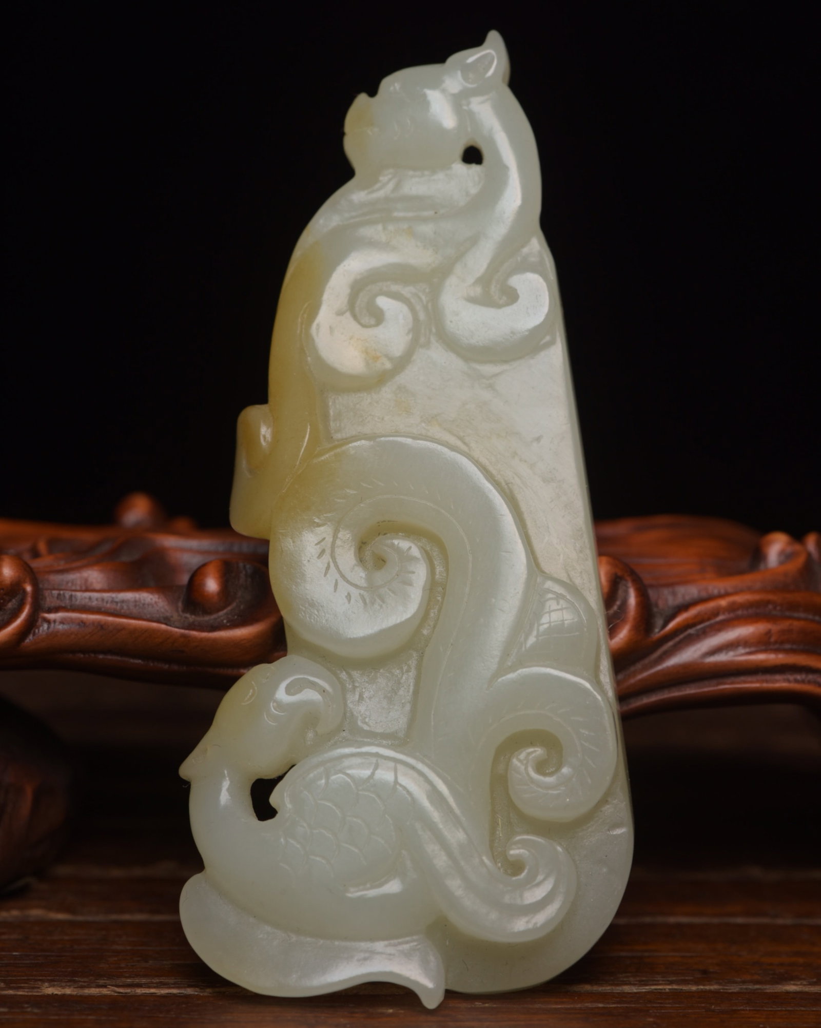 An Exquisite White Jade Dragon and Phoenix Pattern Pendant: An Exquisite White Jade Dragon and Phoenix Pattern Pendant,Qing Dynasty,China,Size:3.6inx1.6inx0.5in,Weight:68g 白玉龙凤纹佩,中国清代
