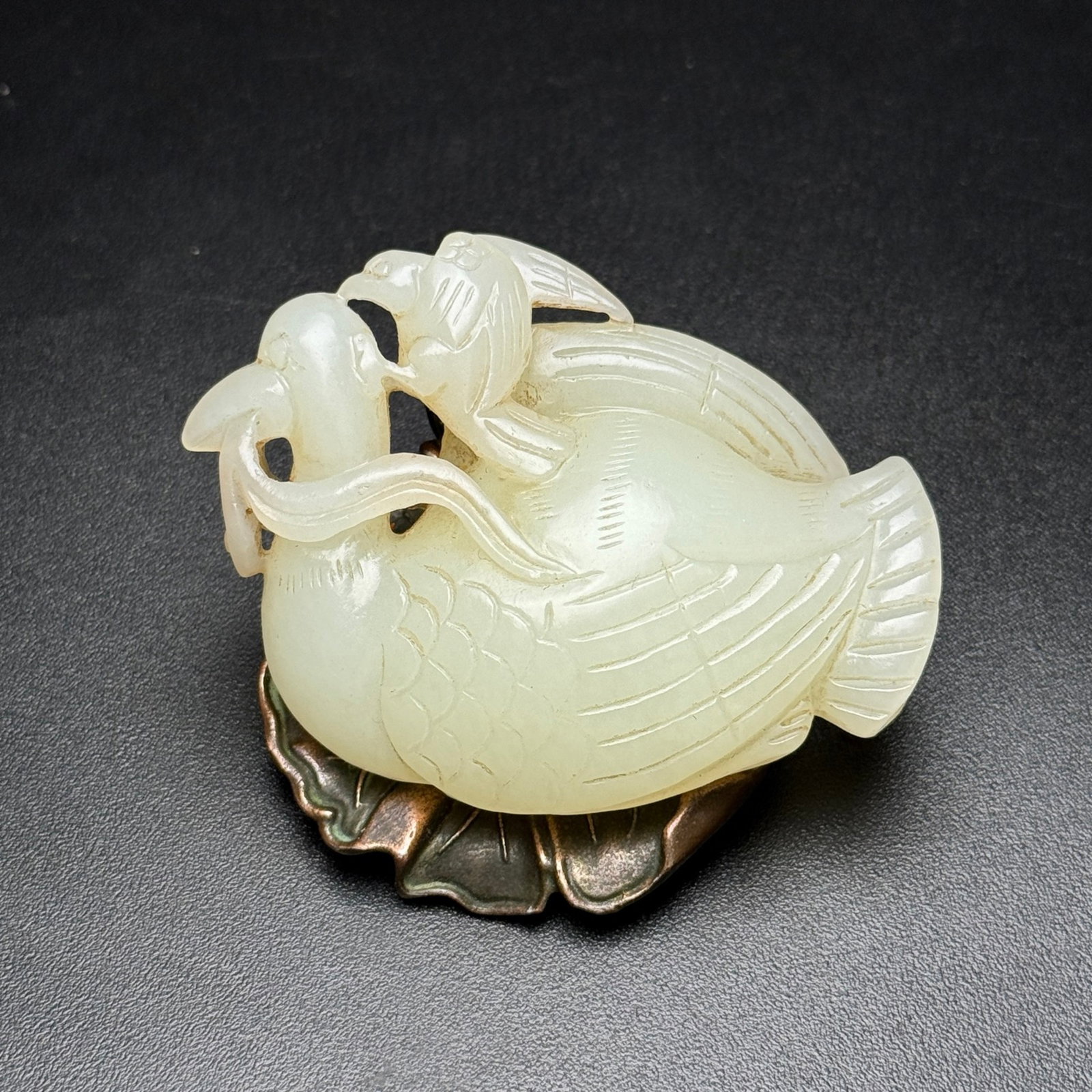 An Exquisite White Jade Phoenix Ornament: An Exquisite White Jade Phoenix Ornament,Qing Dynasty,China,Size:67mmx51mmx19mm,Weight:70g 白玉凤摆件,中国清代