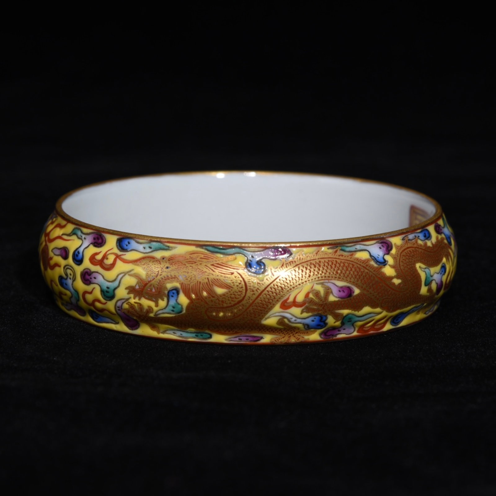 An Exquisite Enamel Gilt Auspicious Cloud and Dragon Pattern Bracelet: An Exquisite Enamel Gilt Auspicious Cloud and Dragon Pattern Bracelet,Qing Dynasty,China,Qianlong Four-character Mark,Size:0.8inx2.8in