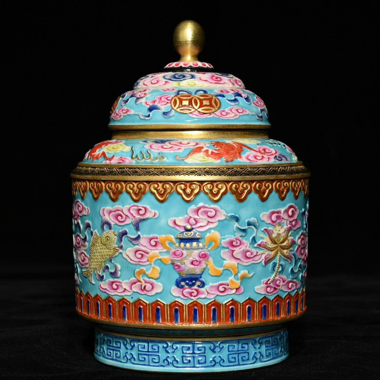 An Exquisite Turquoise Glazed Famille-Rose Eight Treasures Pattern Jar with Cover: An Exquisite Turquoise Glazed Famille-Rose Eight Treasures Pattern Jar with Cover,Qing Dynasty,China,Qianlong Six-Character Mark,Size:5.5inx3.9in