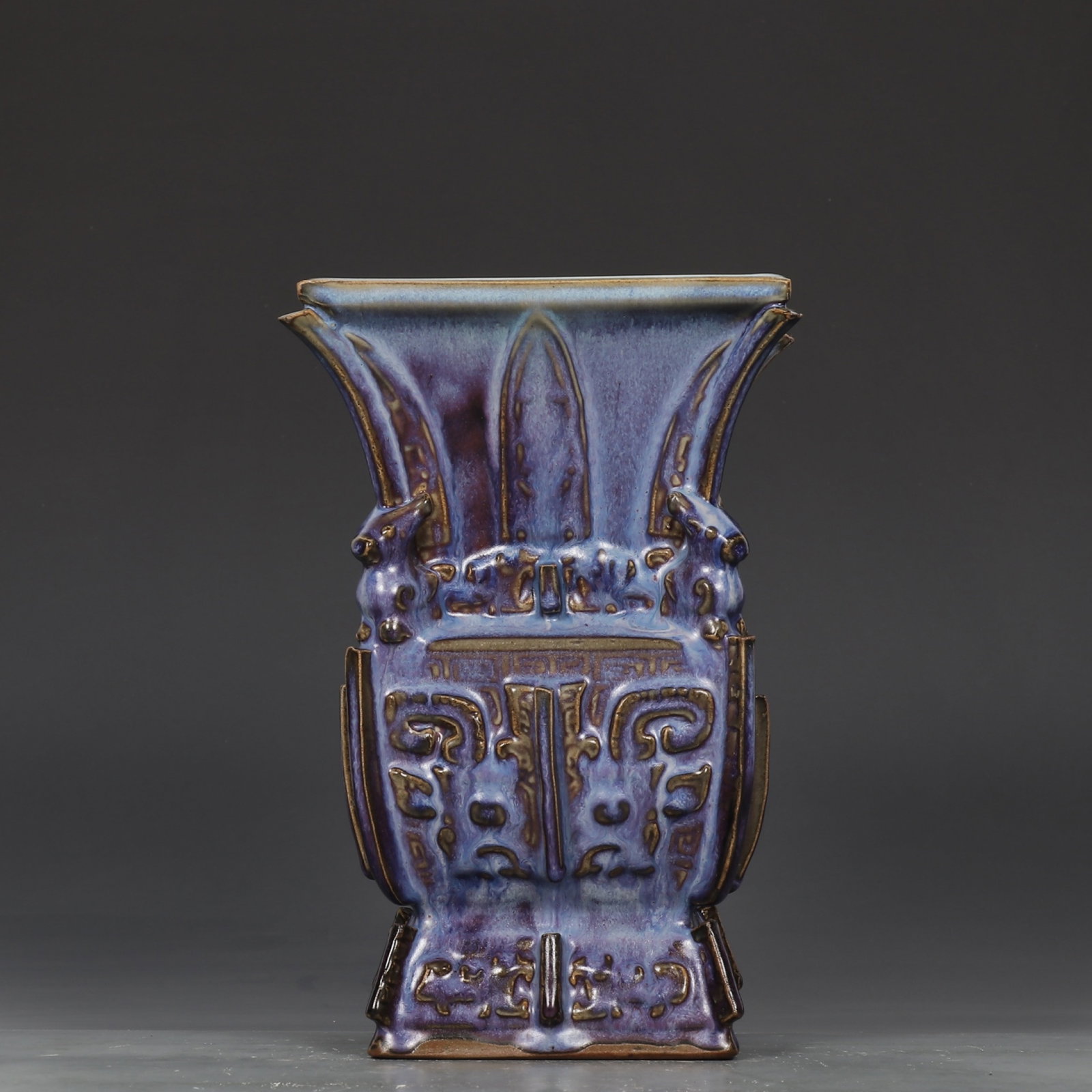 An Exquisite Jun yao Purple Glazed Beast-Face Pattern Sheep-Ears Vase,with an Imperial Poem by: An Exquisite Jun yao Purple Glazed Beast-Face Pattern Sheep-Ears Vase,with an Imperial Poem by Emperor Qianlong,Qing Dynasty,China,Qianlong Six-Character Mark,Size:9.6inx5.9in 钧窑紫