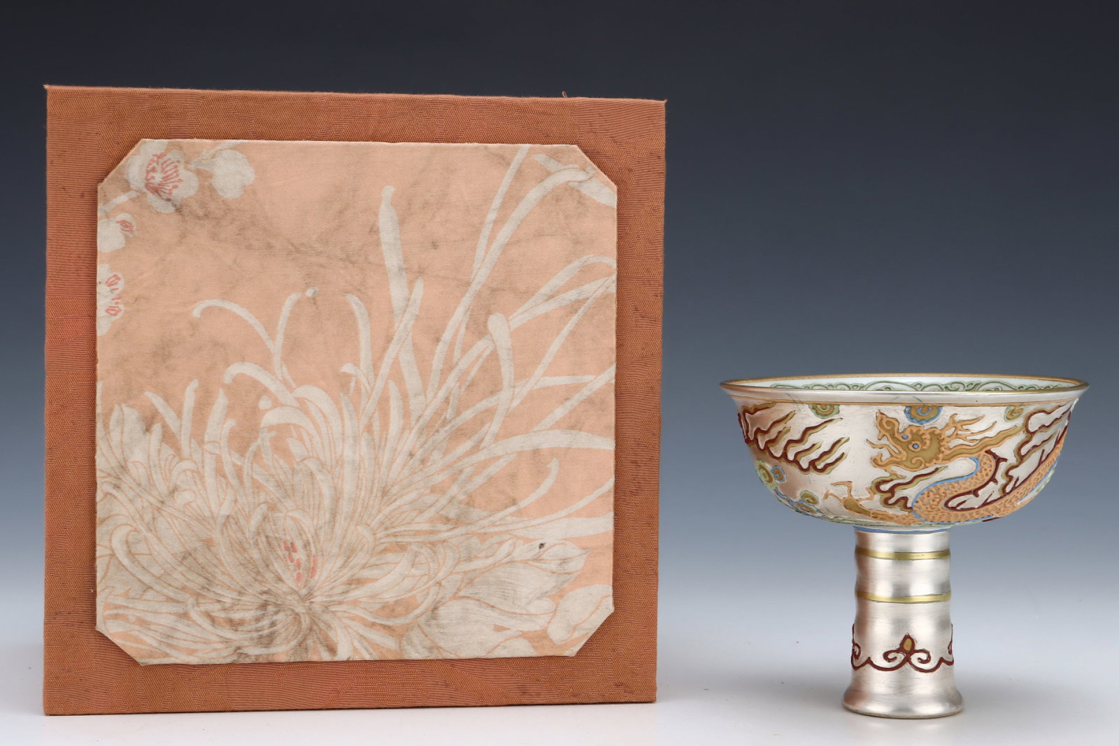 An Exquisite White Glazed Auspicious Cloud and Dragon Pattern Stem Bowl: An Exquisite White Glazed Auspicious Cloud and Dragon Pattern Stem Bowl,Yuan Dynasty,China,Size:4.8inx5.3in