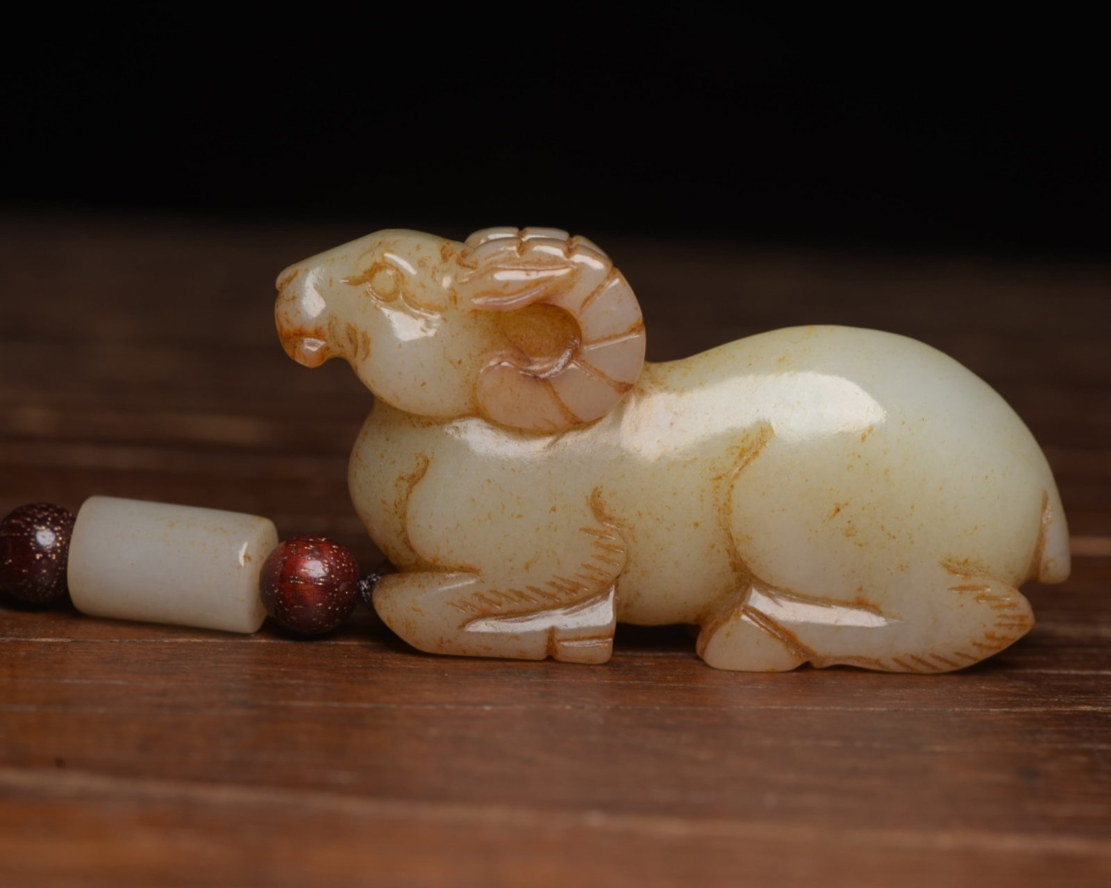 An Exquisite White Jade Sheep Ornament: An Exquisite White Jade Sheep Ornament,Qing Dynasty,China,Size:2.5inx1.3inx0.6in,Weight:57g 白玉羊摆件,中国清代