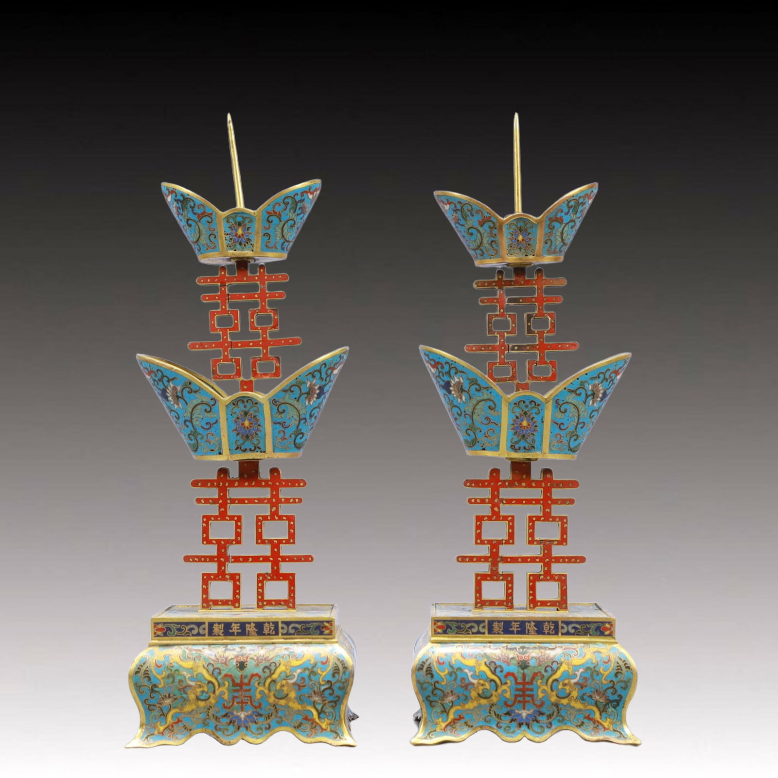 An Exquisite Cloisonne Lotus Pattern Xi-Character Candlesticks: An Exquisite Cloisonne Lotus Pattern Xi-Character Candlesticks ,Qing Dynasty, China,Qianlong Four-character Mark,Size：4.7inx13.8in; Weight：3150g
