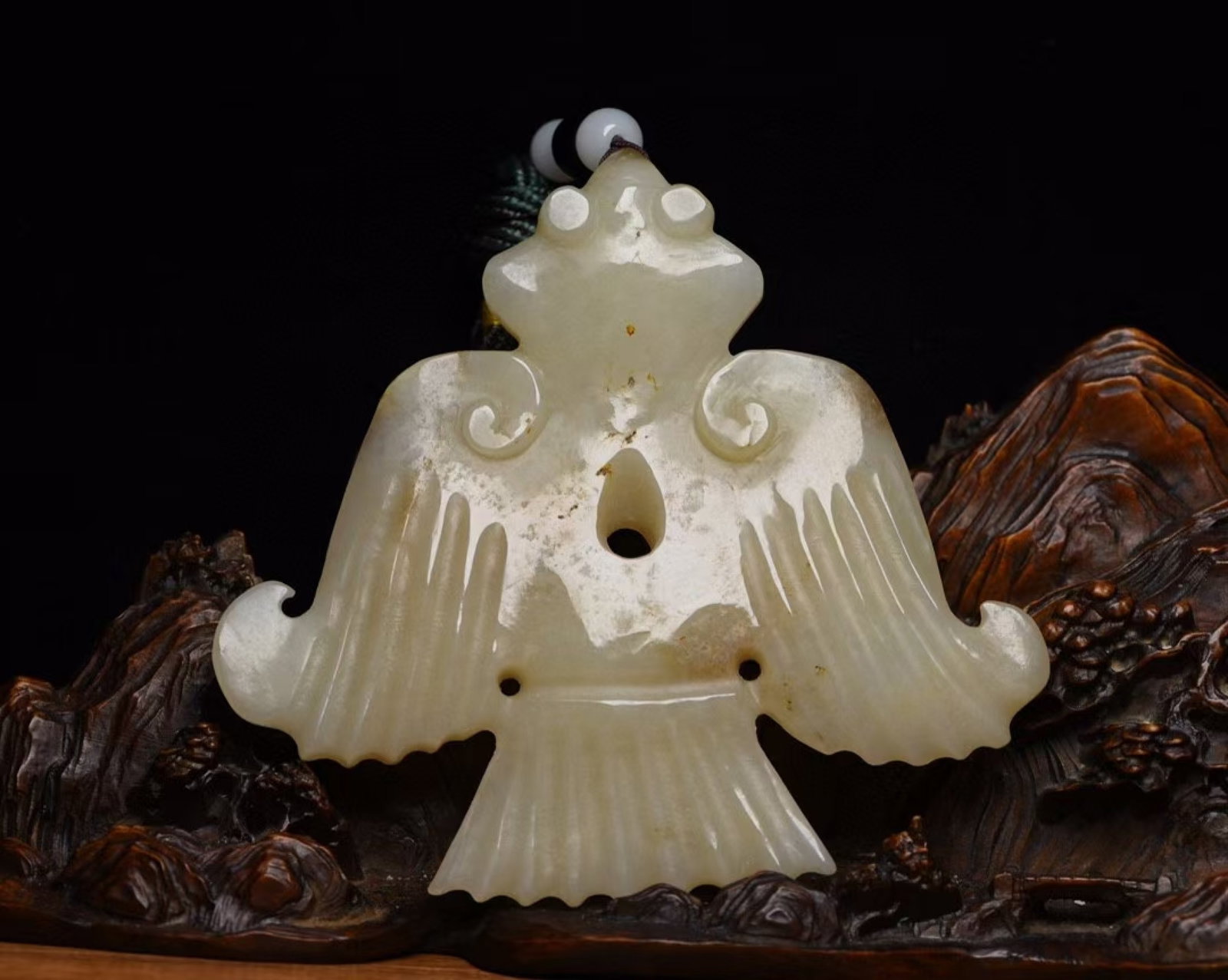 An Exquisite White Jade Bat Pendant (1 of 9)