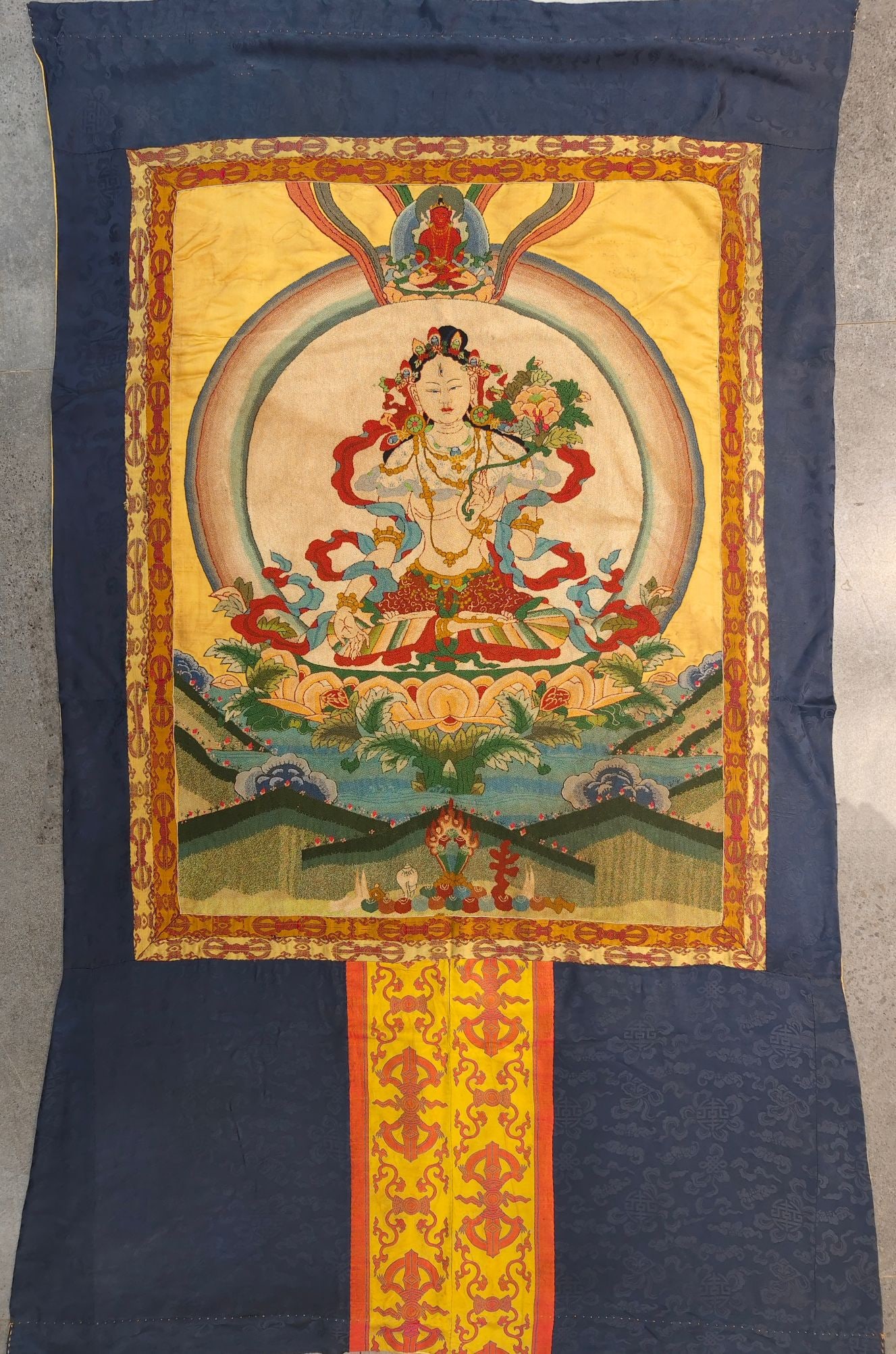 Seed embroidered Tara like thangka: Thangka of Tara Embroidered with Seeds and Embroidered White Tara in Qing Dynasty. Size: 67.3in×38.2in 清代 打籽绣度母唐卡