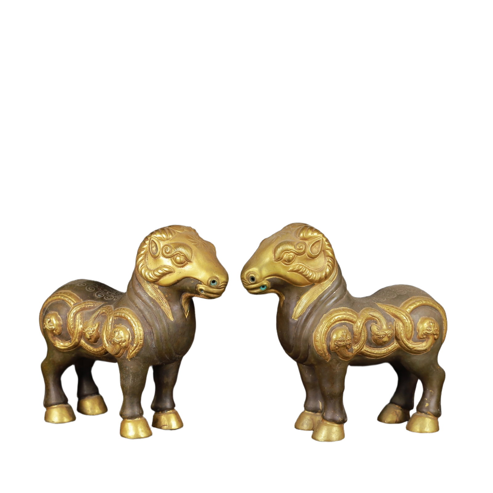 A Pair of Exquisite Gilt Silver Sheep Ornaments: A Pair of Exquisite Gilt Silver Sheep Ornaments,Qing Dynasty,China,Size:4.7inx2inx4.3in,Weight:800g 一对银鎏金羊摆件,中国清代