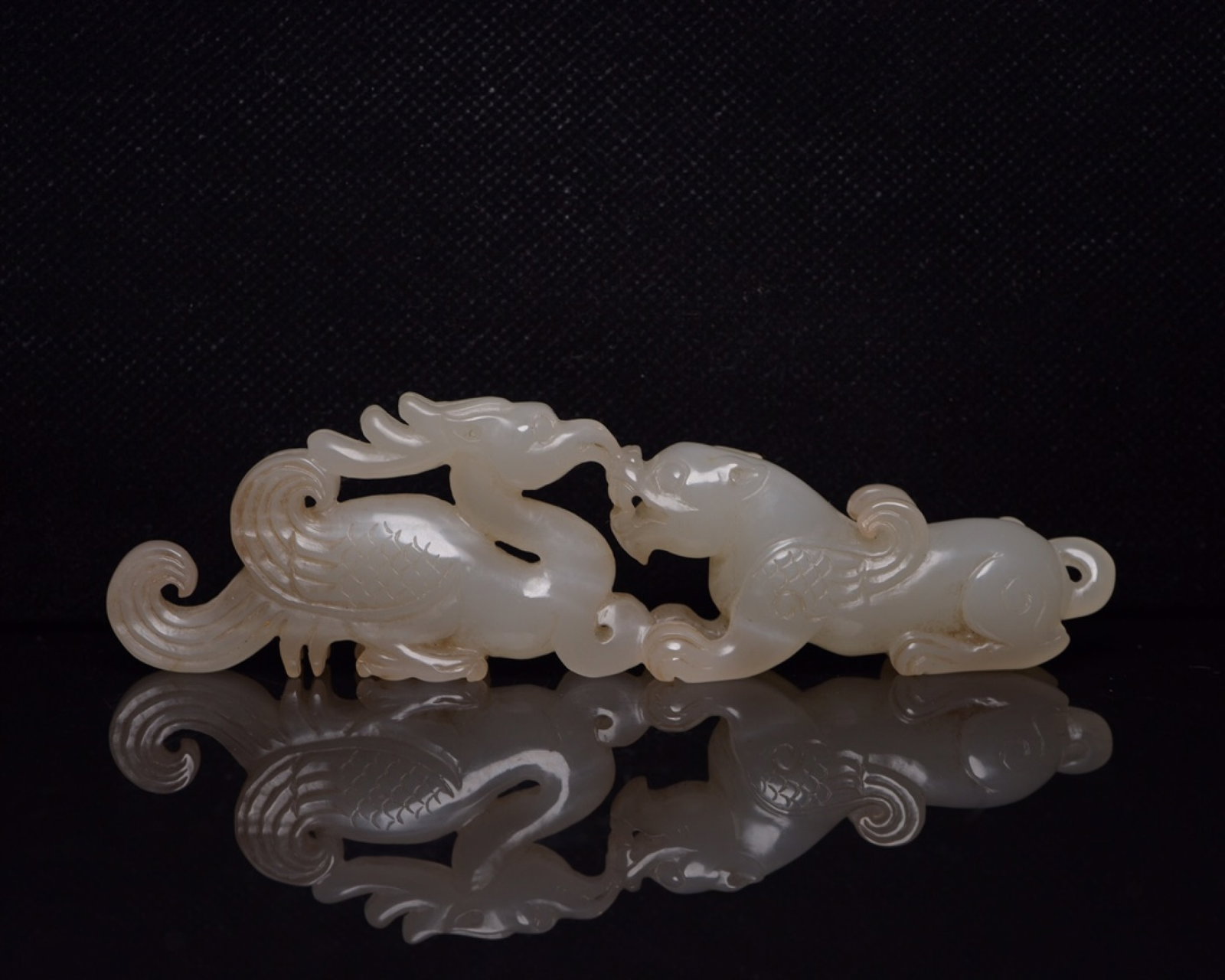 An Exquisite White Jade Dragon and Phoenix Ornament: An Exquisite White Jade Dragon and Phoenix Ornament,Qing Dynasty,China,Size:5.1inx1.5inx0.7in,Weight:93g 白玉龙凤摆件,中国清代