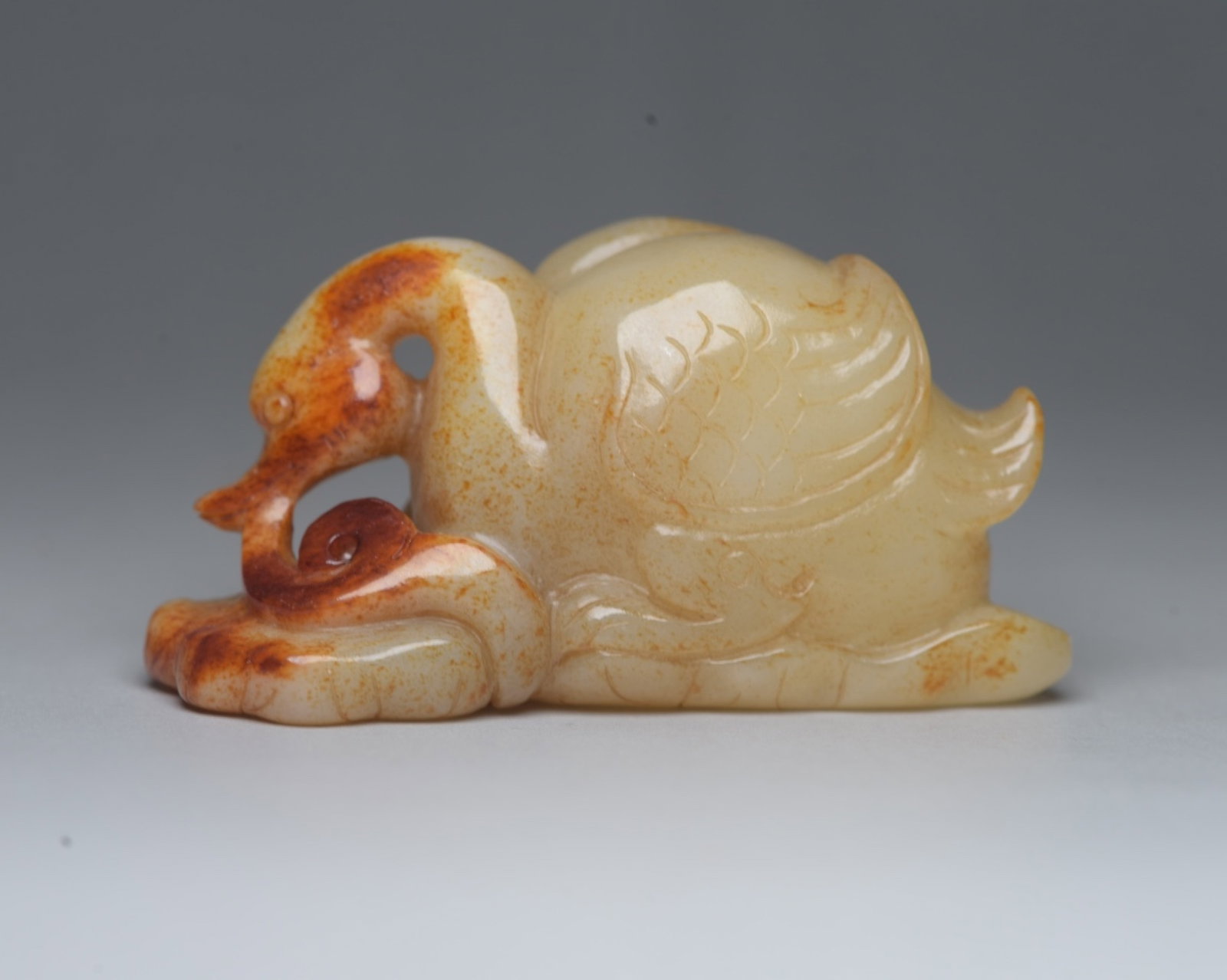 An Exquisite White Jade Goose Ornament: An Exquisite White Jade Goose Ornament,Qing Dynasty,China,Size:2.9inx1.4inx1.2in,Weight:113g 白玉鹅摆件,中国清代