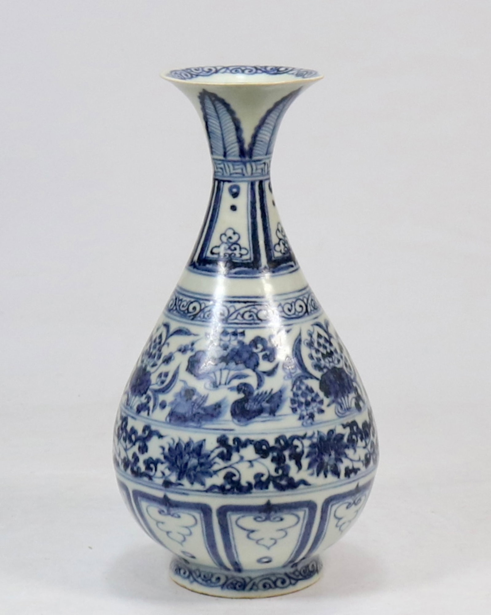An Exquisite Blue and White Flower and Mandarin Duck Pattern Vase: An Exquisite Blue and White Flower and Mandarin Duck Pattern Vase,Yuan Dynasty,China,Size:11.8inx3.7in 青花花卉鸳鸯纹瓶,中国元代