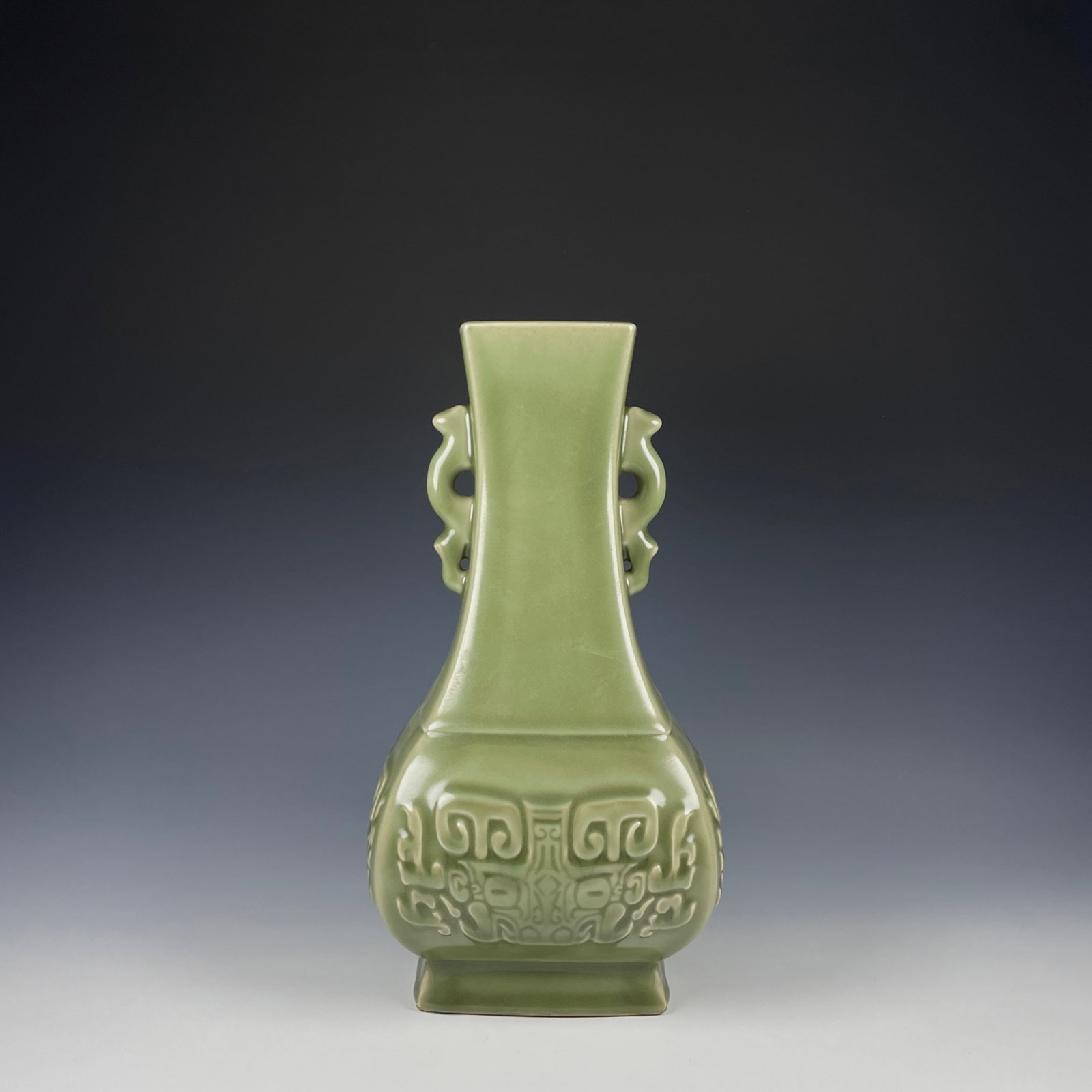 An Exquisite Longquan yao Beast-Face Pattern Double-Ears Vase: An Exquisite Longquan yao Beast-Face Pattern Double-Ears Vase,Song Dynasty,China,Size:11.8inx6.3in 龙泉窑兽面纹双耳瓶,中国宋