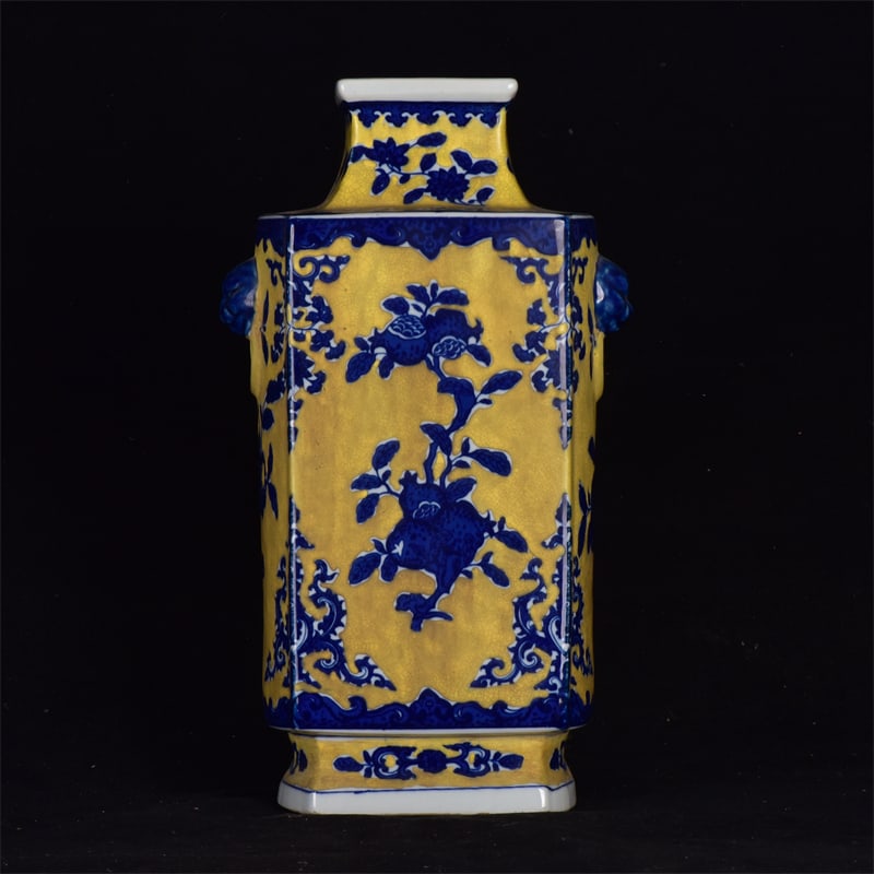 A Rare Yellow Glazed Blue and White Flower and Fruit Pattern Beast-Ears Vase: A Rare Yellow Glazed Blue and White Flower and Fruit Pattern Beast-Ears Vase,Qing Dynasty,China,Qianlong Six-Character Mark,Size:13.4inx7.5inx5.1in 黄釉青花花果 