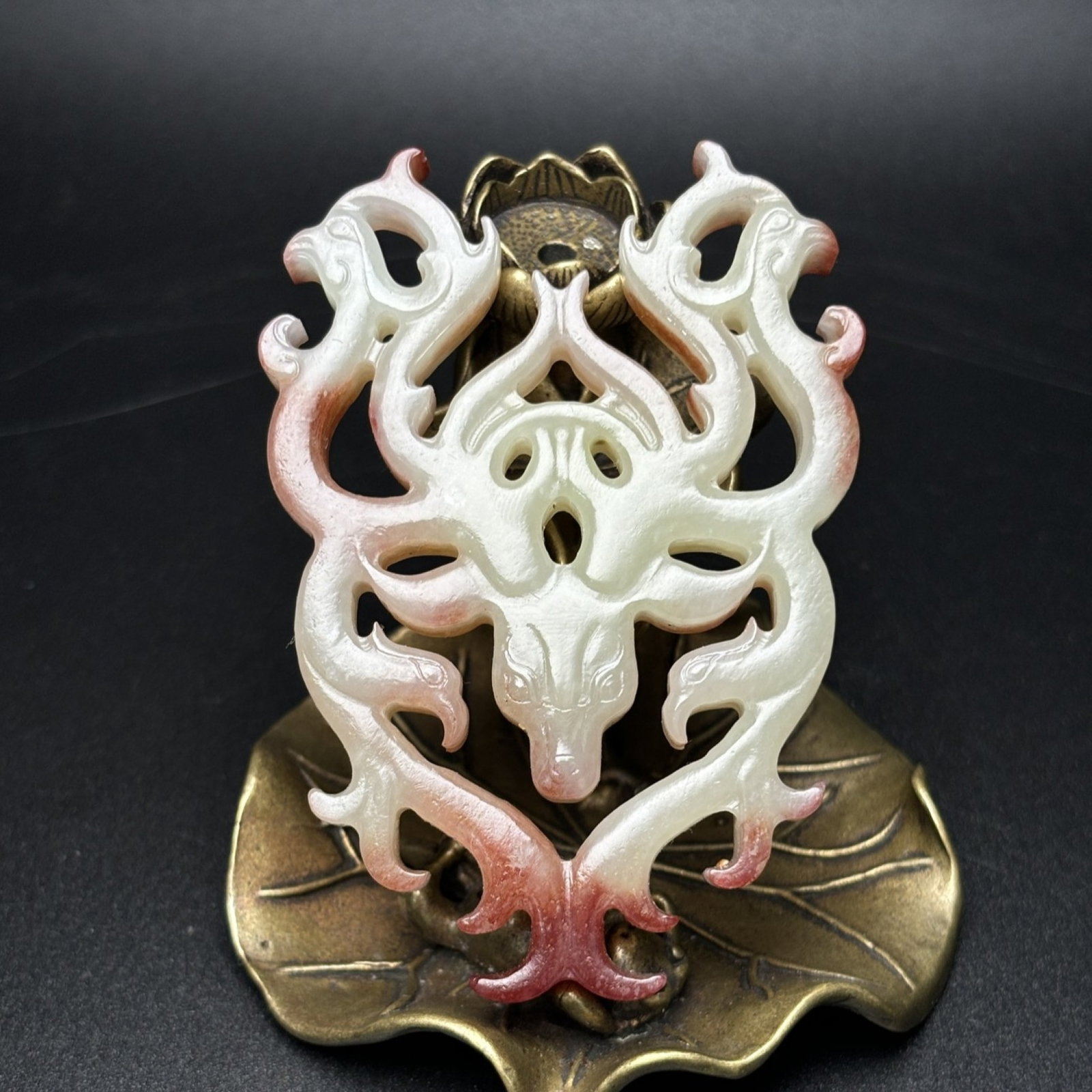 An Exquisite White Jade Deer Pendant: An Exquisite White Jade Deer Pendant,Qing Dynasty, China,Size:53mmx74mmx10mm,Weight:51g 白玉鹿挂件,中国清代