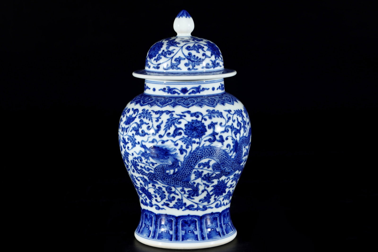 An Exquisite Blue and White Lotus and Dragon Pattern Jar with Cover: An Exquisite Blue and White Lotus and Dragon Pattern Jar with Cover,Qing Dynasty,China,Qianlong Six-character Mark,Size:9.1inx4.9in 青花缠枝莲龙纹盖 