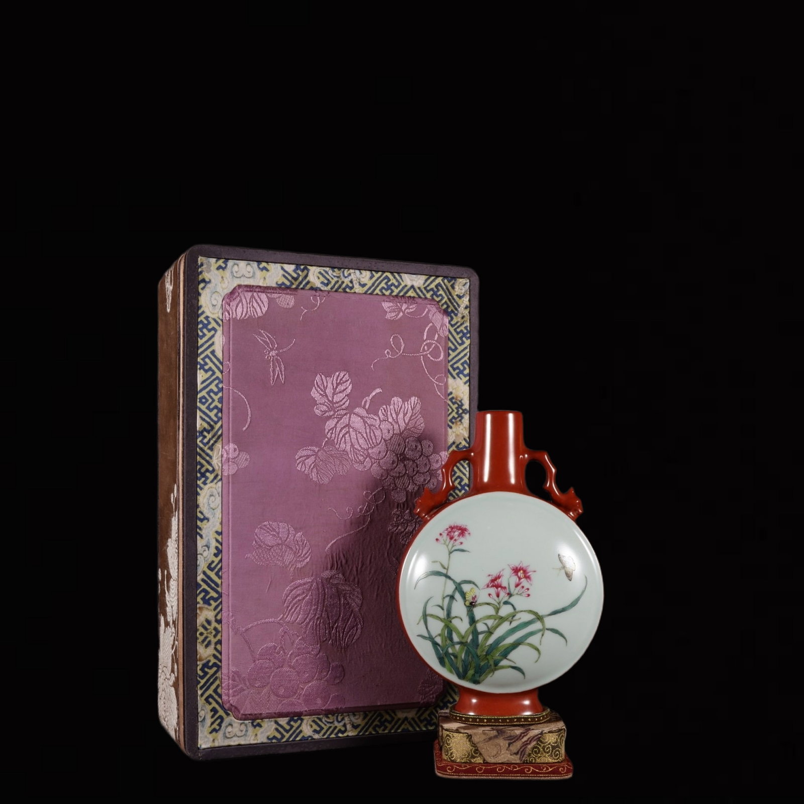 An Exquisite Famille-Rose Flower and Butterfly Pattern Double-Ears Vase: An Exquisite Famille-Rose Flower and Butterfly Pattern Double-Ears Vase,Qing Dynasty,China,Qianlong Six-character Mark,Size:8.1inx2.3in