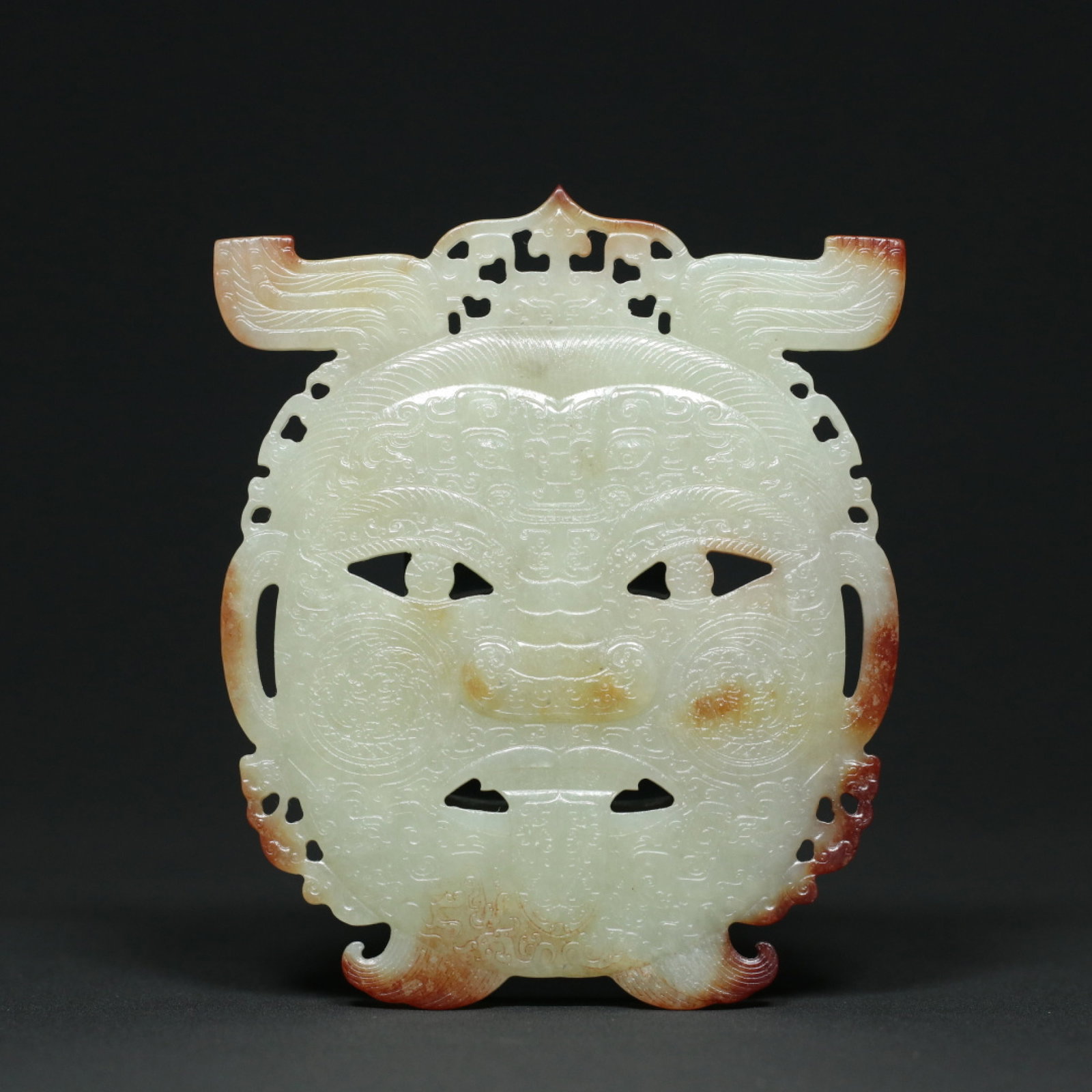 An Exquisite White Jade Figure-Face Pattern Mask: An Exquisite White Jade Figure-Face Pattern Mask,Han Dynasty,China,Size:4.3inx3.6inx0.2in,Weight:104.3g 白玉人面纹面具,中国汉代