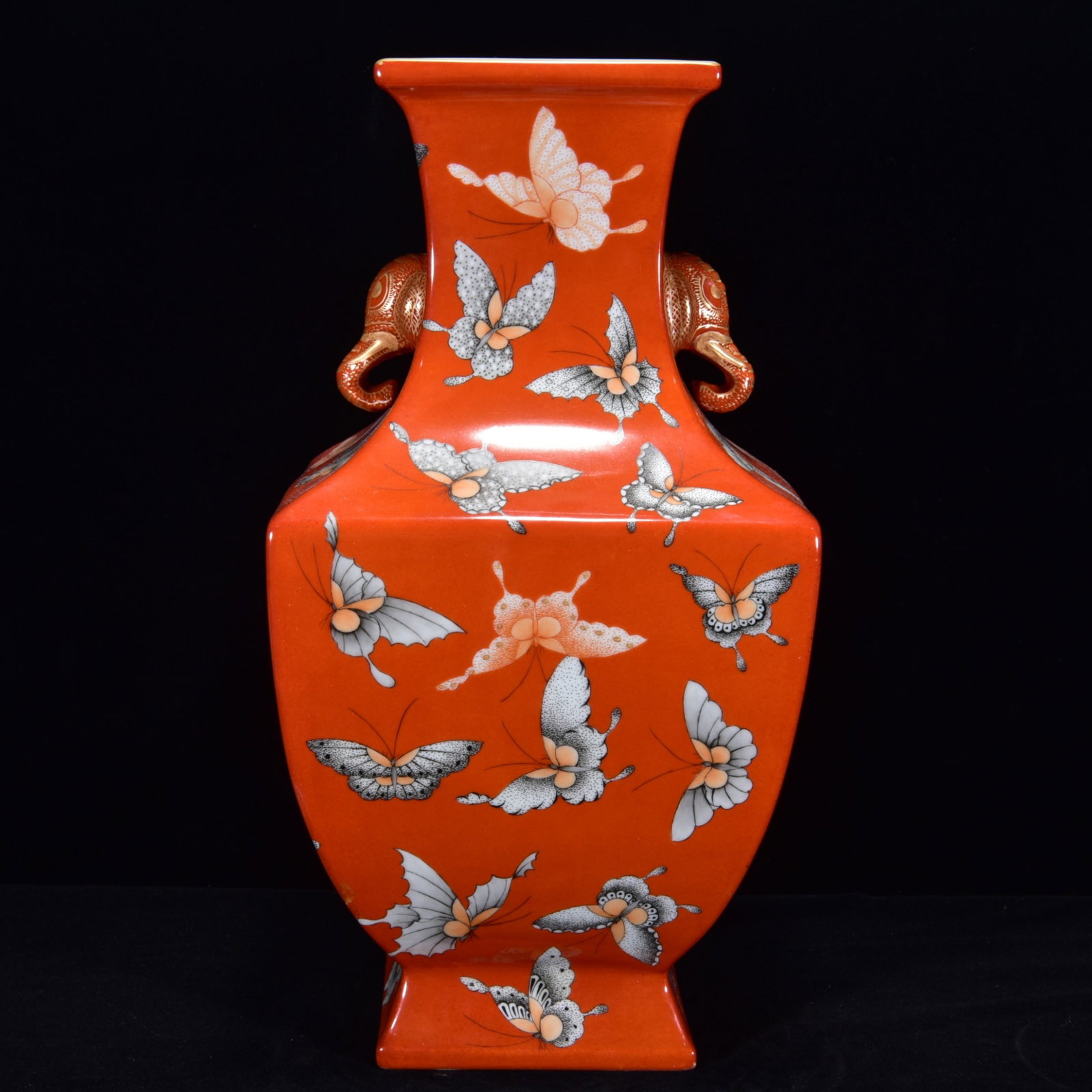A Rare Red Glazed Famille-Rose Butterfly Pattern Elephant-Ears Vase: A Rare Red Glazed Famille-Rose Butterfly Pattern Elephant-Ears Vase,Qing Dynasty,China,Qianlong Six-Character Mark,Size:13inx7.1in 红釉粉彩蝴蝶纹象ň