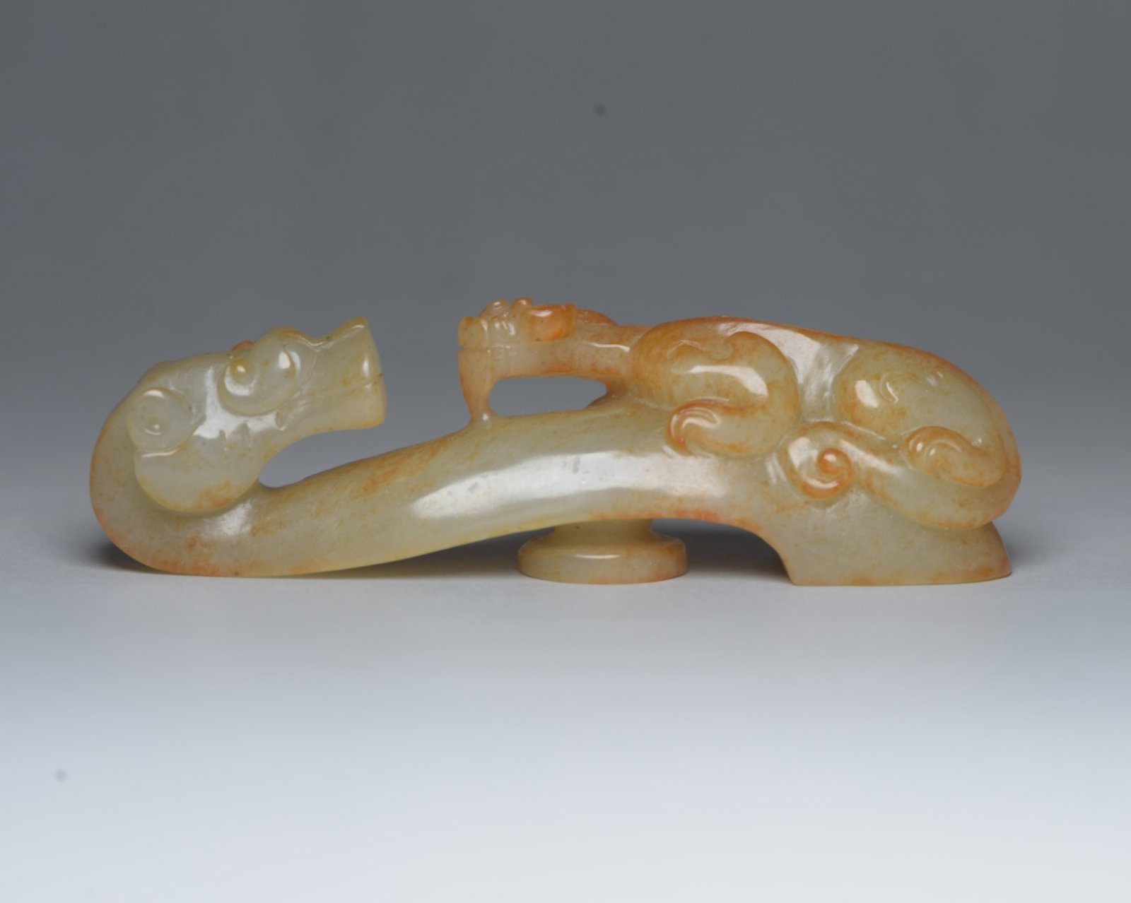 An Exquisite White Jade Dragon Ornament: An Exquisite White Jade Dragon Ornament,Qing Dynasty,China,Size:3.7inx1.1inx0.7in,Weight:62g 白玉龙摆件,中国清代