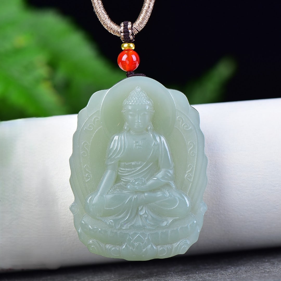 An Exquisite White Jade Statue of Sakyamuni Pendant: An Exquisite White Jade Statue of Sakyamuni Pendant,Size:40mmx53mm 白玉释迦摩尼像挂件