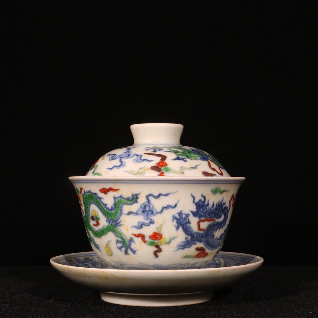 An Exquisite Doucai Auspicious Cloud and Dragon Pattern Bowl with Cover,with Plate: An Exquisite Doucai Auspicious Cloud and Dragon Pattern Bowl with Cover,with Plate,Ming Dynasty,China,Chenghua Six-character Mark,Size:4.5inx4.7in 斗彩祥云龙纹İ