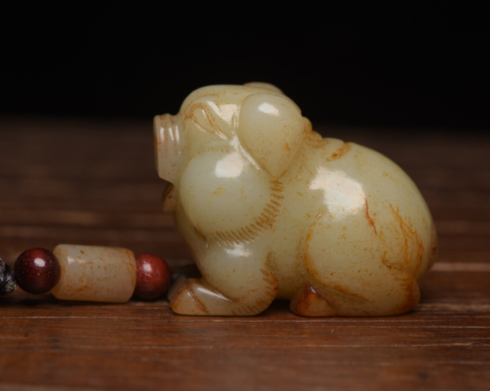 An Exquisite White Jade Pig Ornament: An Exquisite White Jade Pig Ornament,Qing Dynasty,China,Size:2inx1.5inx1.1in,Weight:103g 白玉猪摆件,中国清代