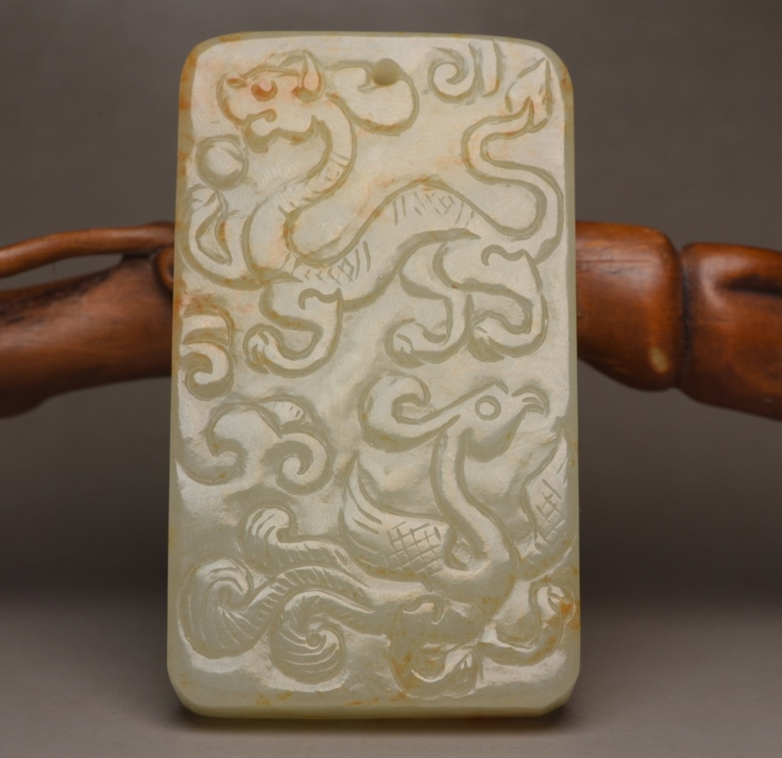 An Exquisite White Jade Auspicious Beast Pattern Pendant (1 of 7)
