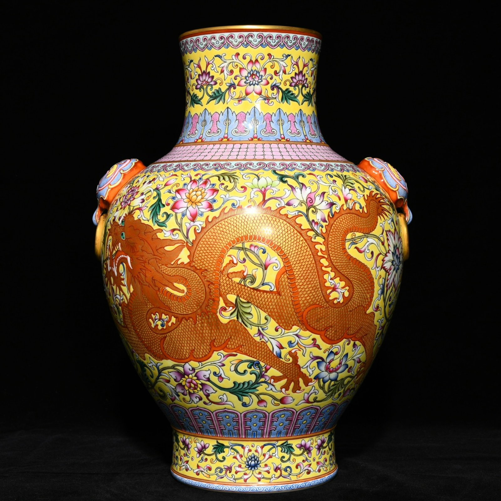 A Rare Yellow Ground Famille-Rose Painted Gold Lotus and Dragon Pattern Beast-Ears Vase: A Rare Yellow Ground Famille-Rose Painted Gold Lotus and Dragon Pattern Beast-Ears Vase,Qing Dynasty,China,Qianlong Six-Character Mark,Size:14.9inx10.8in 黄地粉彩描ດ