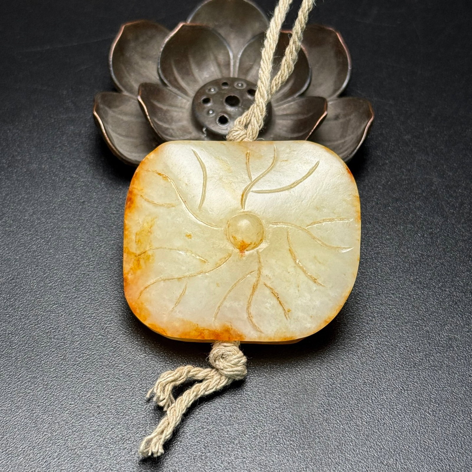 An Exquisite White Jade Lotus Pattern Pendant: An Exquisite White Jade Lotus Pattern Pendant,Qing Dynasty,China,Size:49mmx41mmx17mm,Weight:52g 白玉荷花纹挂件,中国清代