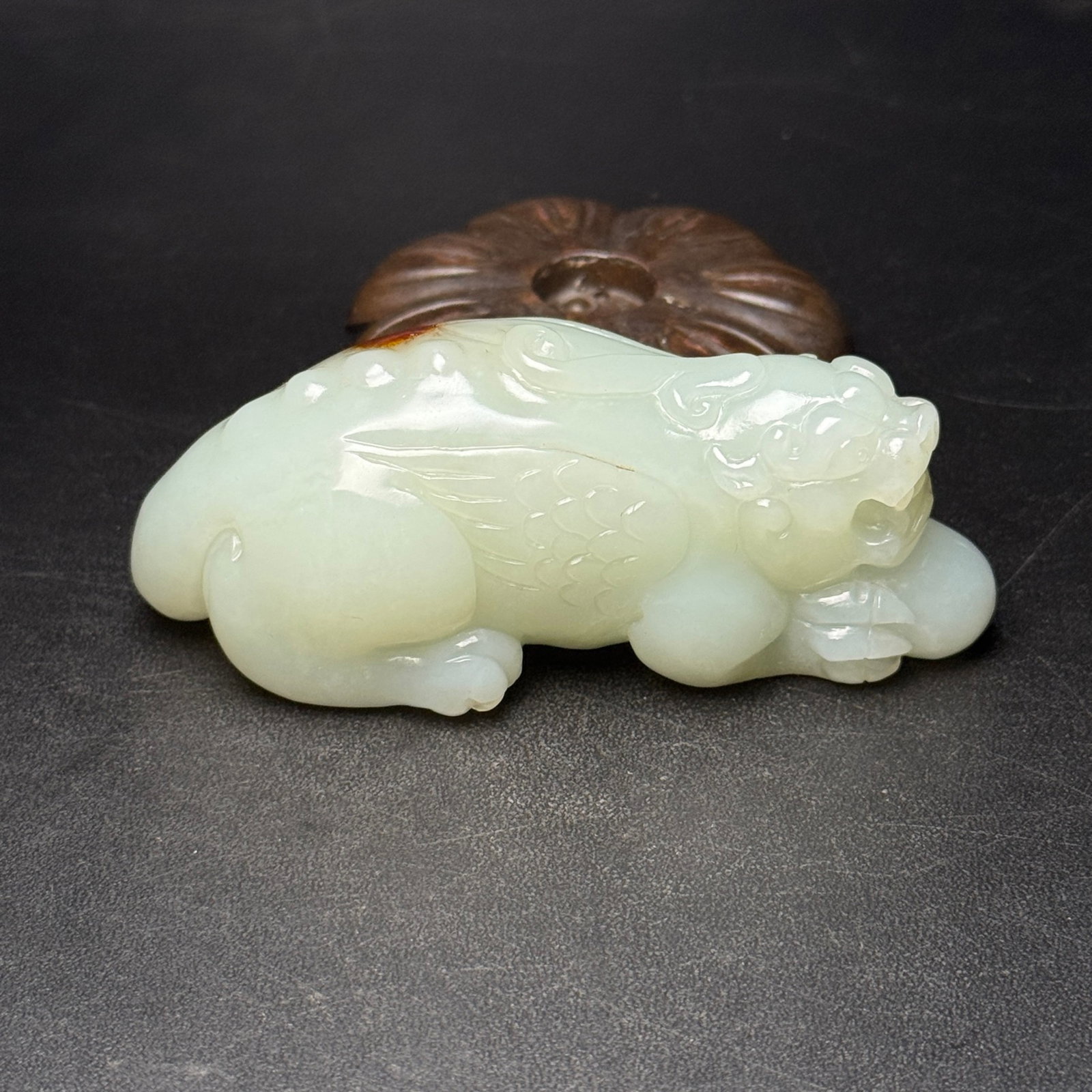 An Exquisite White Jade Wealth-Attracting Creature Ornament: An Exquisite White Jade Wealth-Attracting Creature Ornament,Qing Dynasty,China,Size:90mmx37mmx37mm,Weight:166g 白玉貔貅摆件,中国清代
