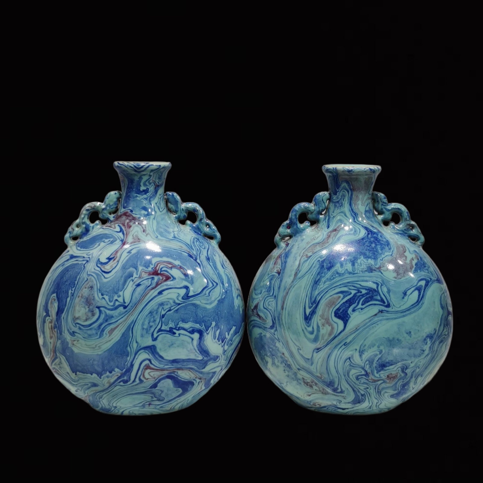 An Exquisite Blue Glazed Seawater Pattern Double-Ears Vase: An Exquisite Blue Glazed Seawater Pattern Double-Ears Vase,Qing Dynasty,China,Qianlong Six-Character Mark,Size:10.6inx9.1in 蓝釉海水纹双耳瓶,中