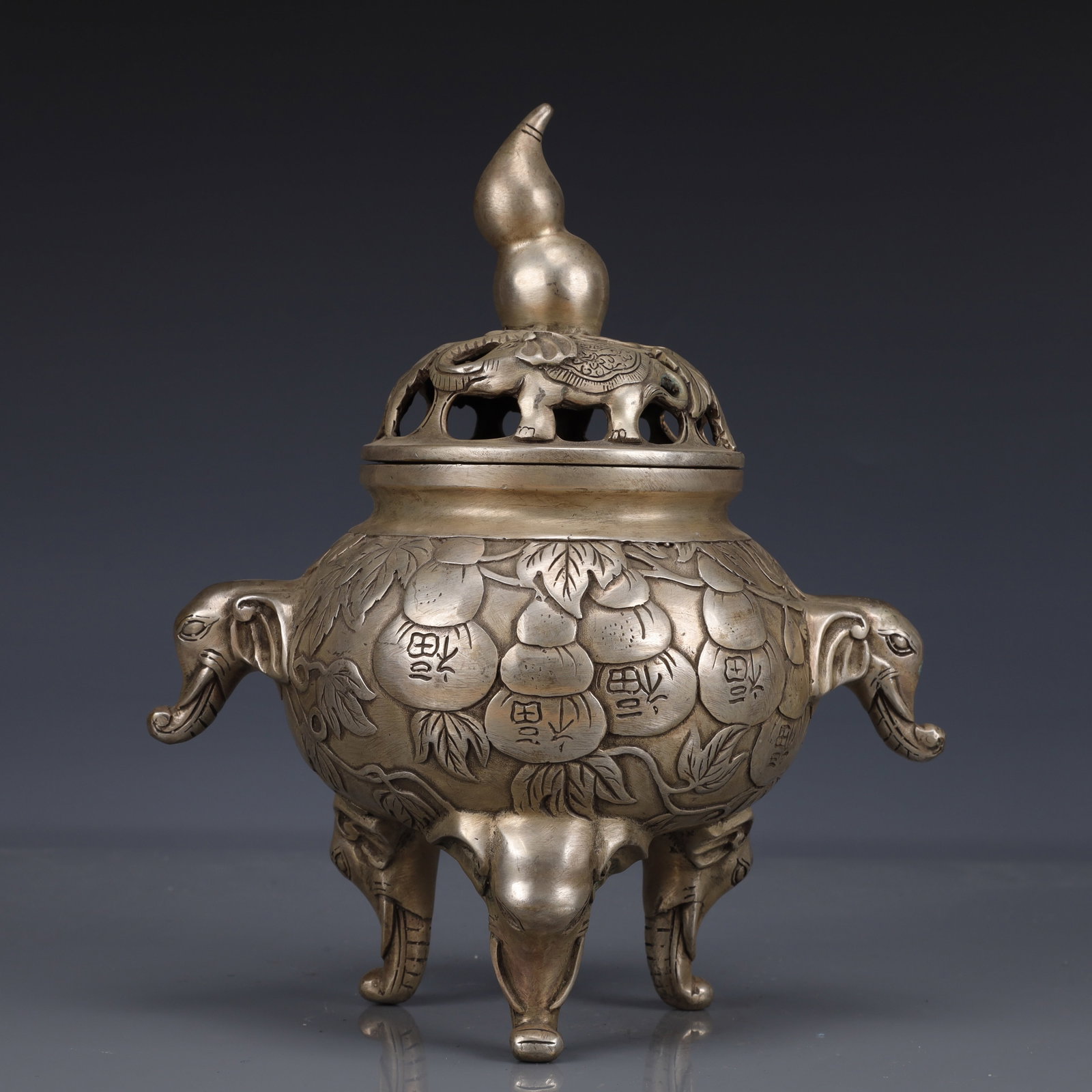 An Exquisite Silver-Plated Bronze Fu-Character Pattern Double-Ears and Tripod Censer: An Exquisite Silver-Plated Bronze Fu-Character Pattern Double-Ears and Tripod Censer,Qing Dynasty, China,Qianlong Four-character Mark,Size:8.7inx5.9inx9.4in,Weight:1550g 铜镀银ధ