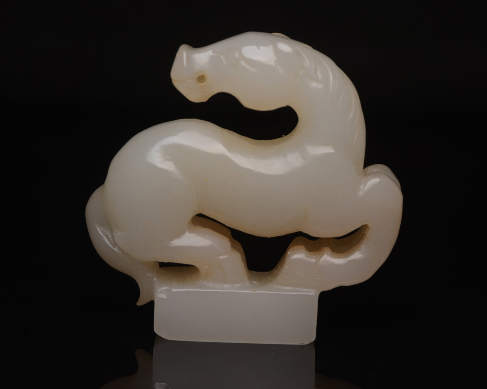 An Exquisite White Jade Horse Ornament: An Exquisite White Jade Horse Ornament,Qing Dynasty,China,Size:2.1inx2inx0.6in,Weight:57g 白玉骏马摆件,中国清代