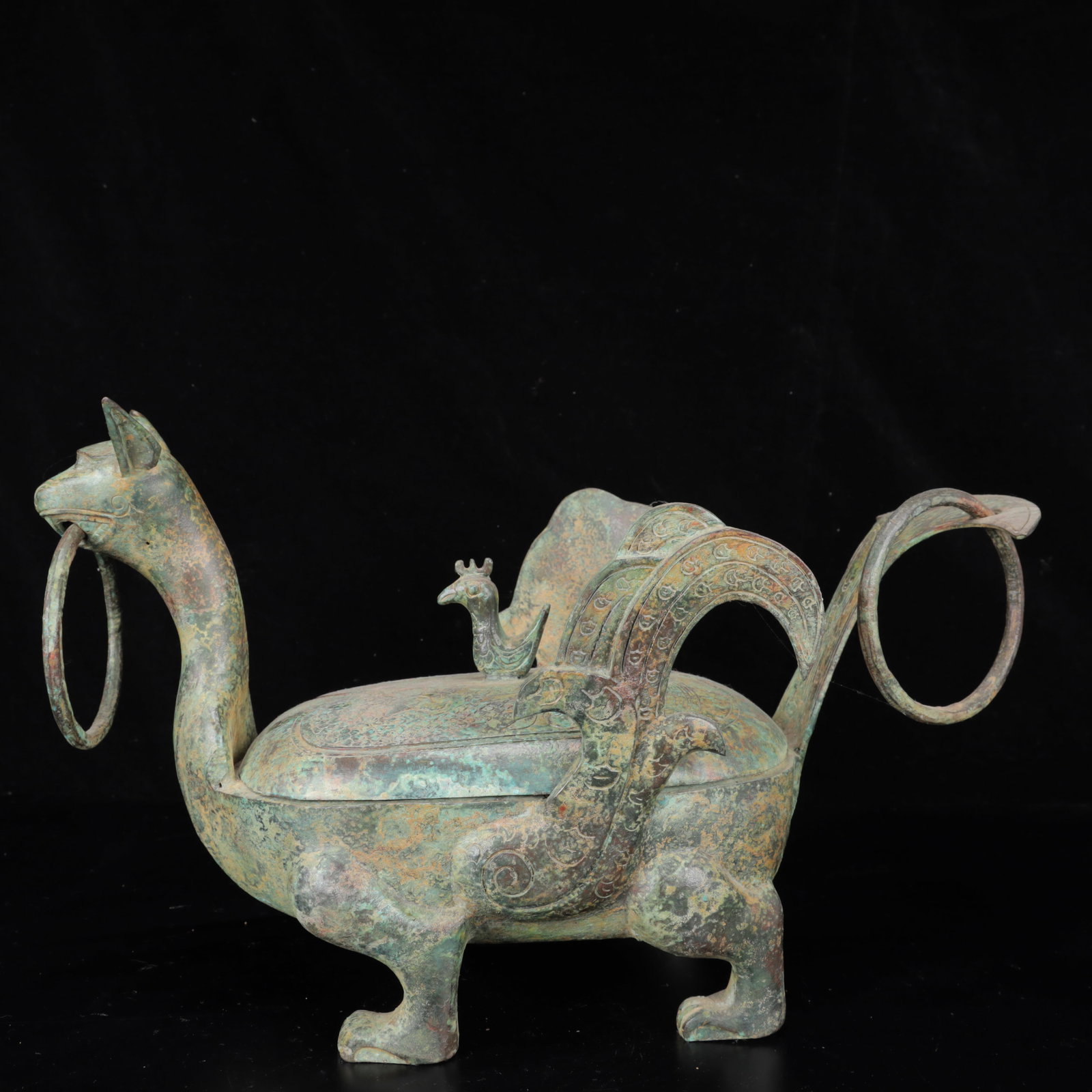 An Archaic Bronze Auspicious Beast Censer: An Archaic Bronze Auspicious Beast Censer,The Warring States period in China,With Mark,Size:16.9inx8.7inx7.9in,Weight:4350g 青铜瑞兽香炉,中国战
