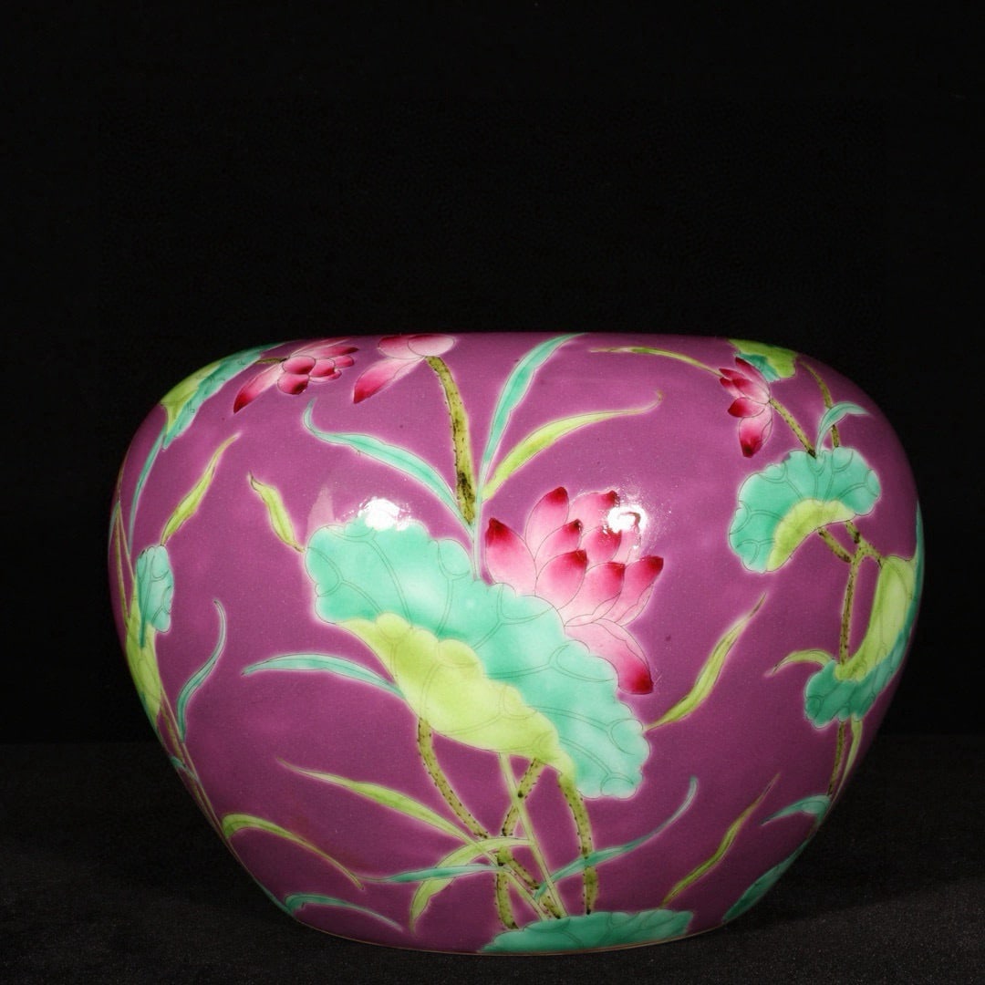An Exquisite Purple Glazed Lotus Pattern Jar: An Exquisite Purple Glazed Lotus Pattern Jar,Qing Dynasty,China,With Mark,Size:5.3inx7.7in 紫釉荷花纹罐,中国清代,带款