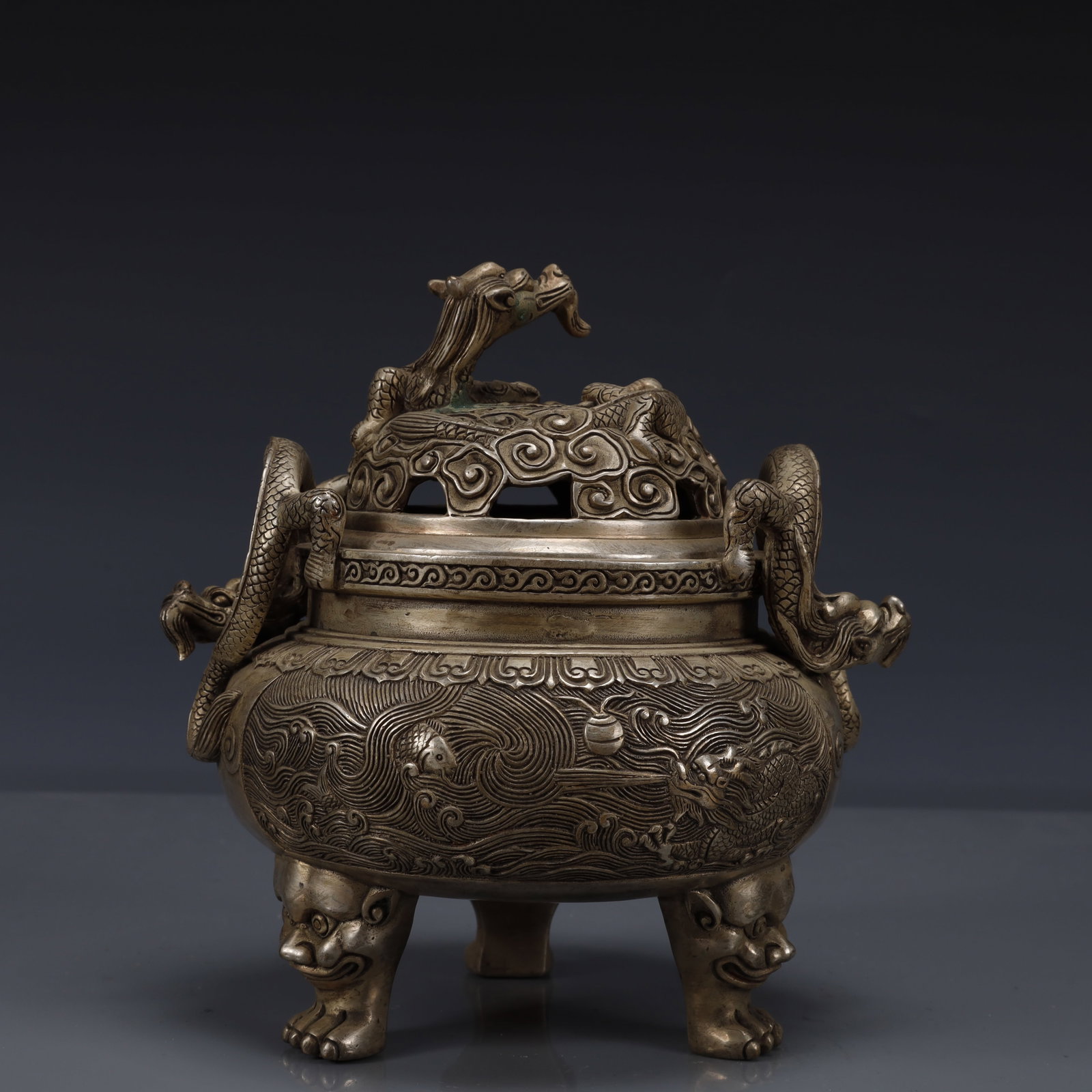 An Exquisite Silver-Plated Bronze Dragon Pattern Double-Ears and Tripod Censer: An Exquisite Silver-Plated Bronze Dragon Pattern Double-Ears and Tripod Censer,Qing Dynasty, China,Qianlong Four-character Mark,Size:7.1inx5.5inx7.1in,Weight:1600g 铜镀银龙 